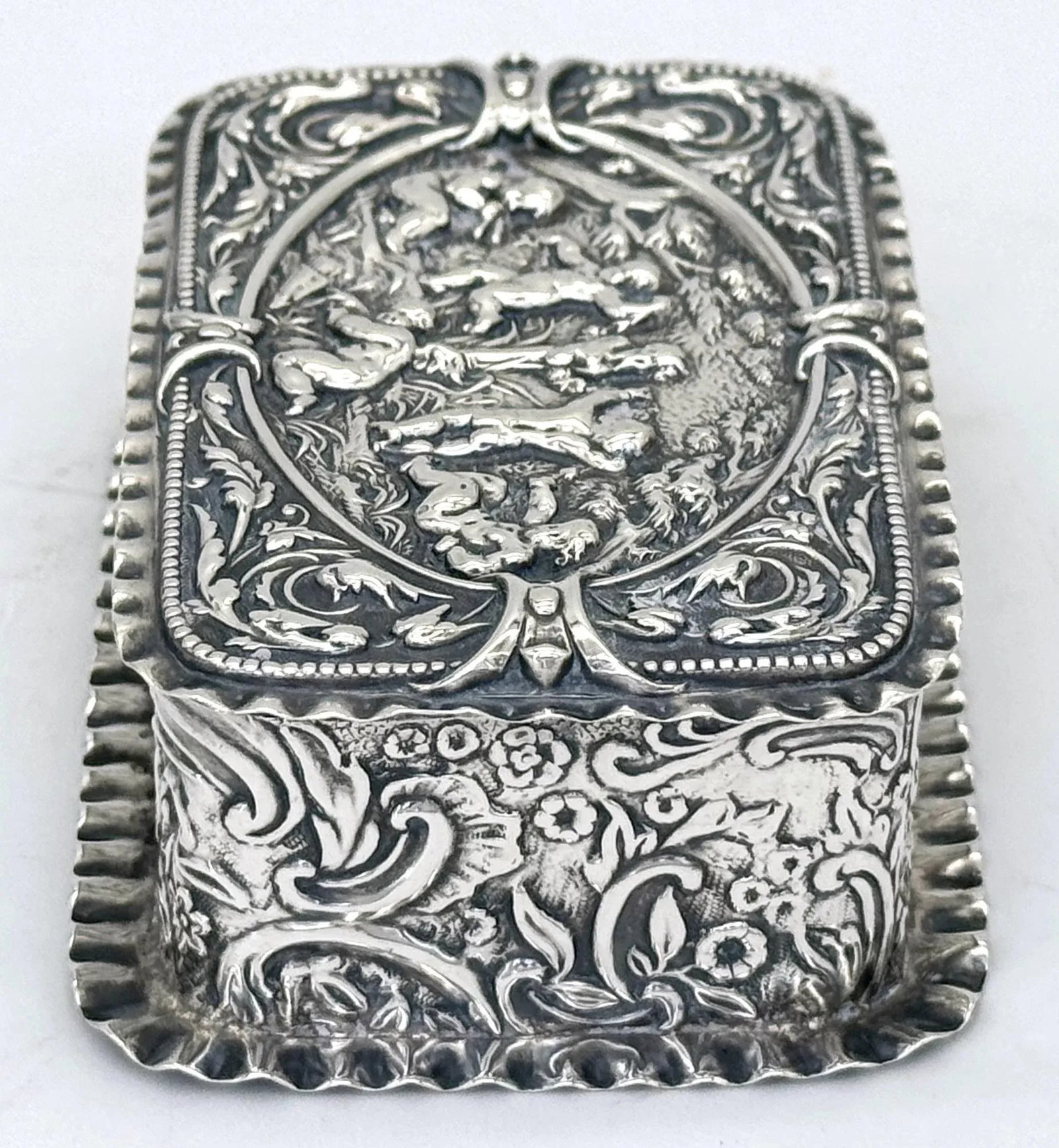 Victorian Sterling Silver Repoussé Trinket Box Putti Garden Scene, London, 1886 - 7