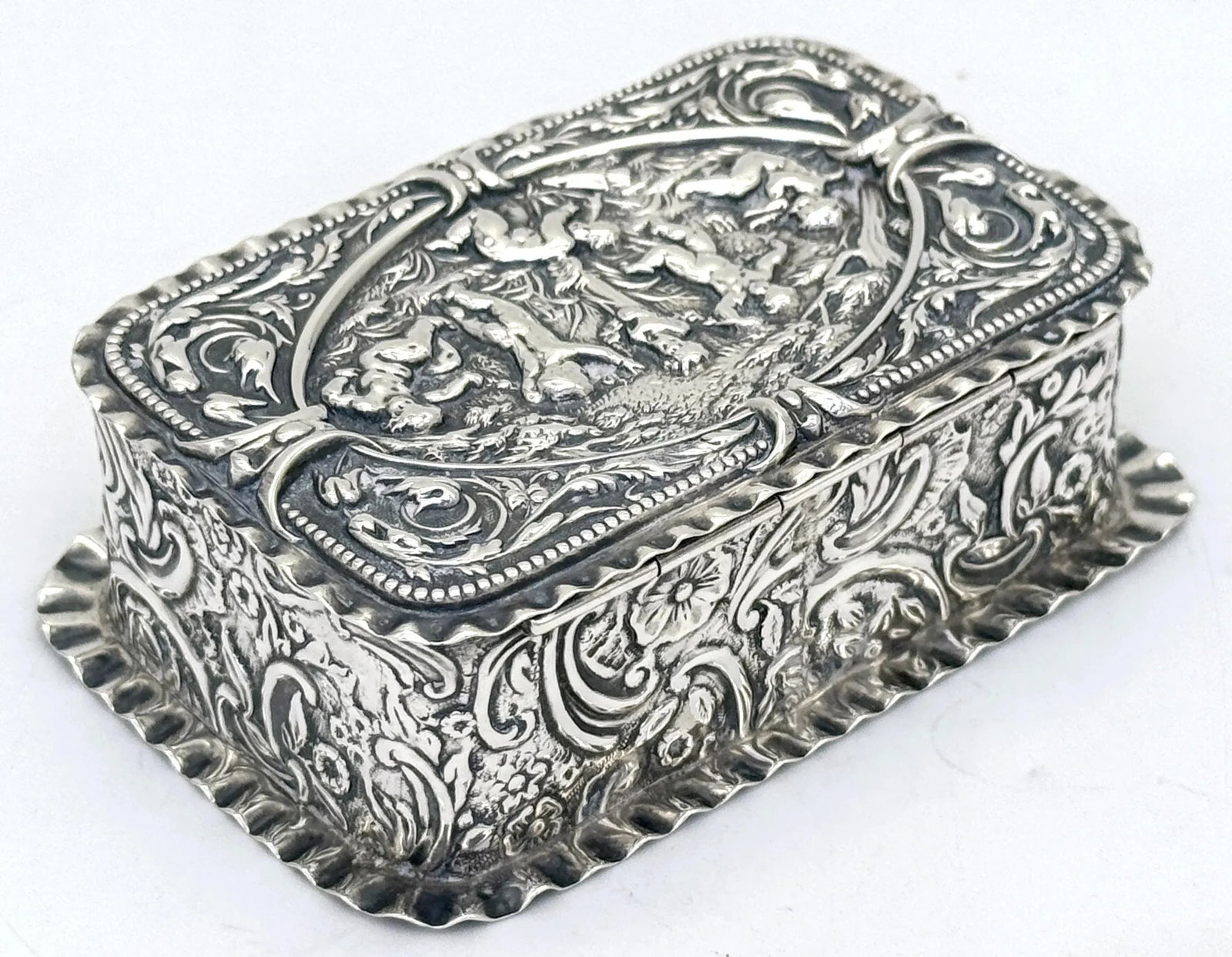 Victorian Sterling Silver Repoussé Trinket Box Putti Garden Scene, London, 1886 - 8