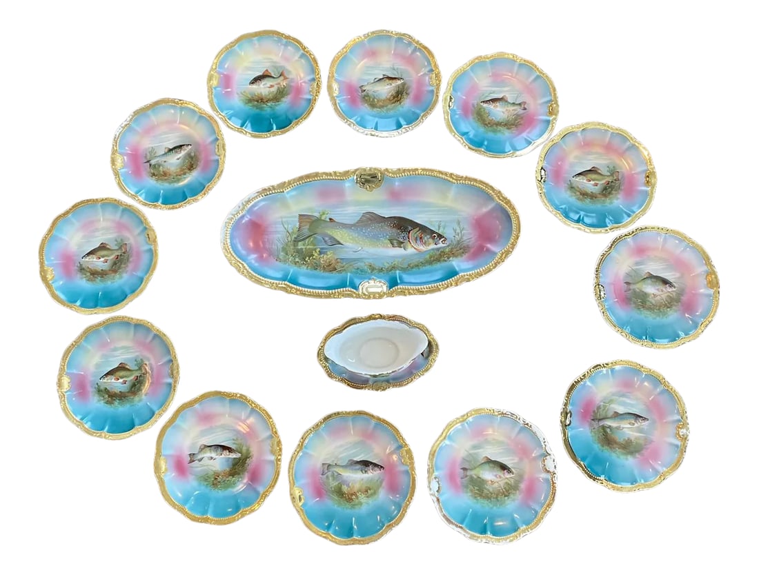 German Porcelain Handpainted Gold Gilt Fish Serving Set -Set of 15: A vibrant set of 12 hand painted gold gilt fish plates with matching large platter and gravy or sauce boat. Each plate is beautifully shaped and accented with 24 karat gold, hand painted with a