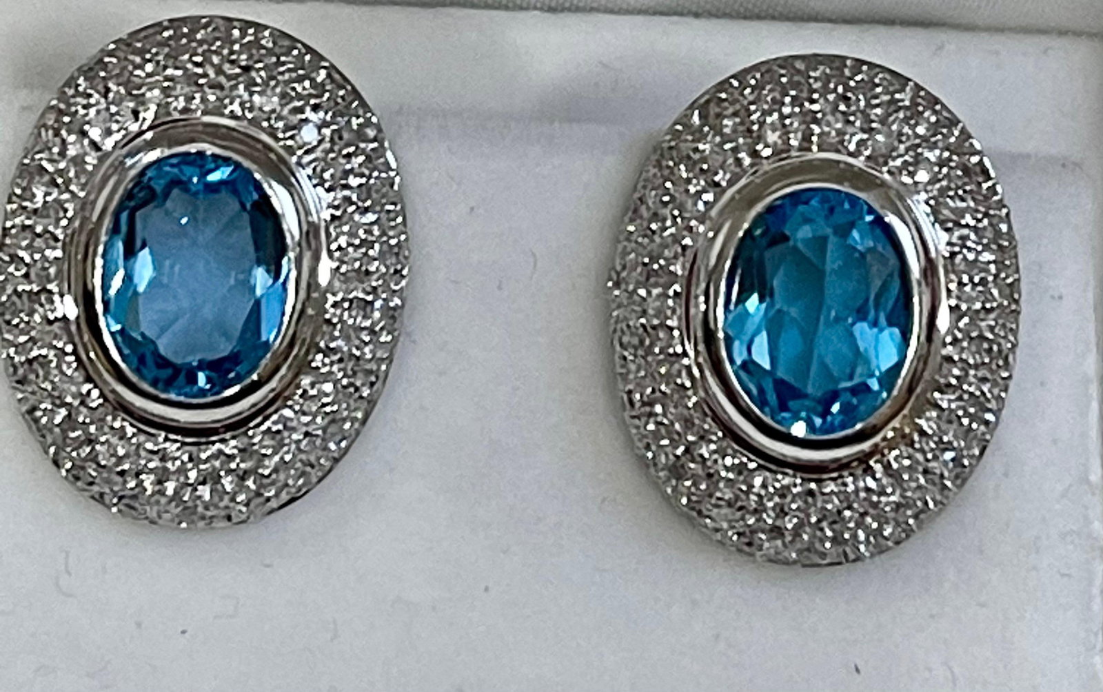 5 Carat Oval Shape Blue Topaz and Diamond Omega Back Clip Earring 14 Karat Gold - 16
