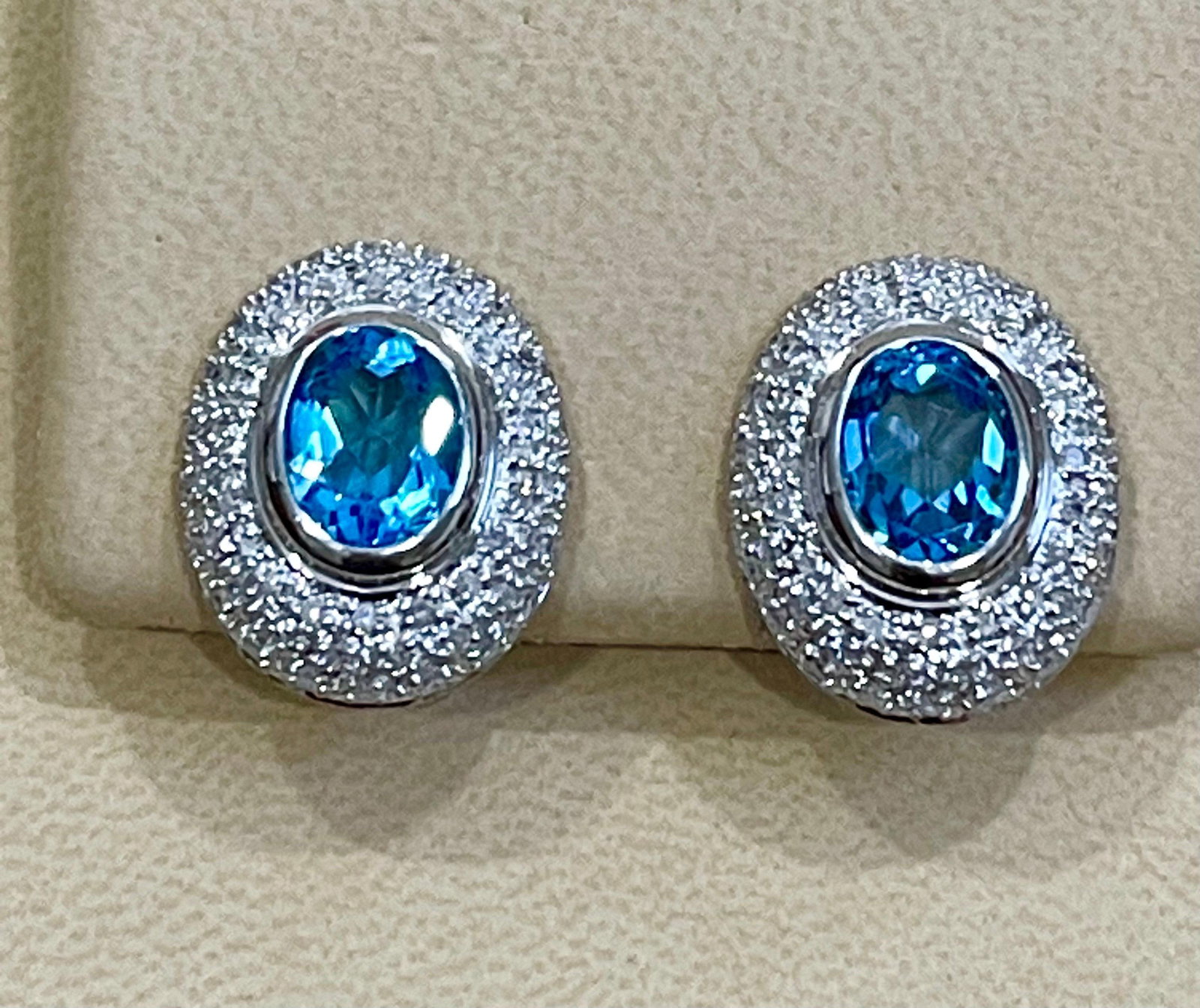 5 Carat Oval Shape Blue Topaz and Diamond Omega Back Clip Earring 14 Karat Gold - 18