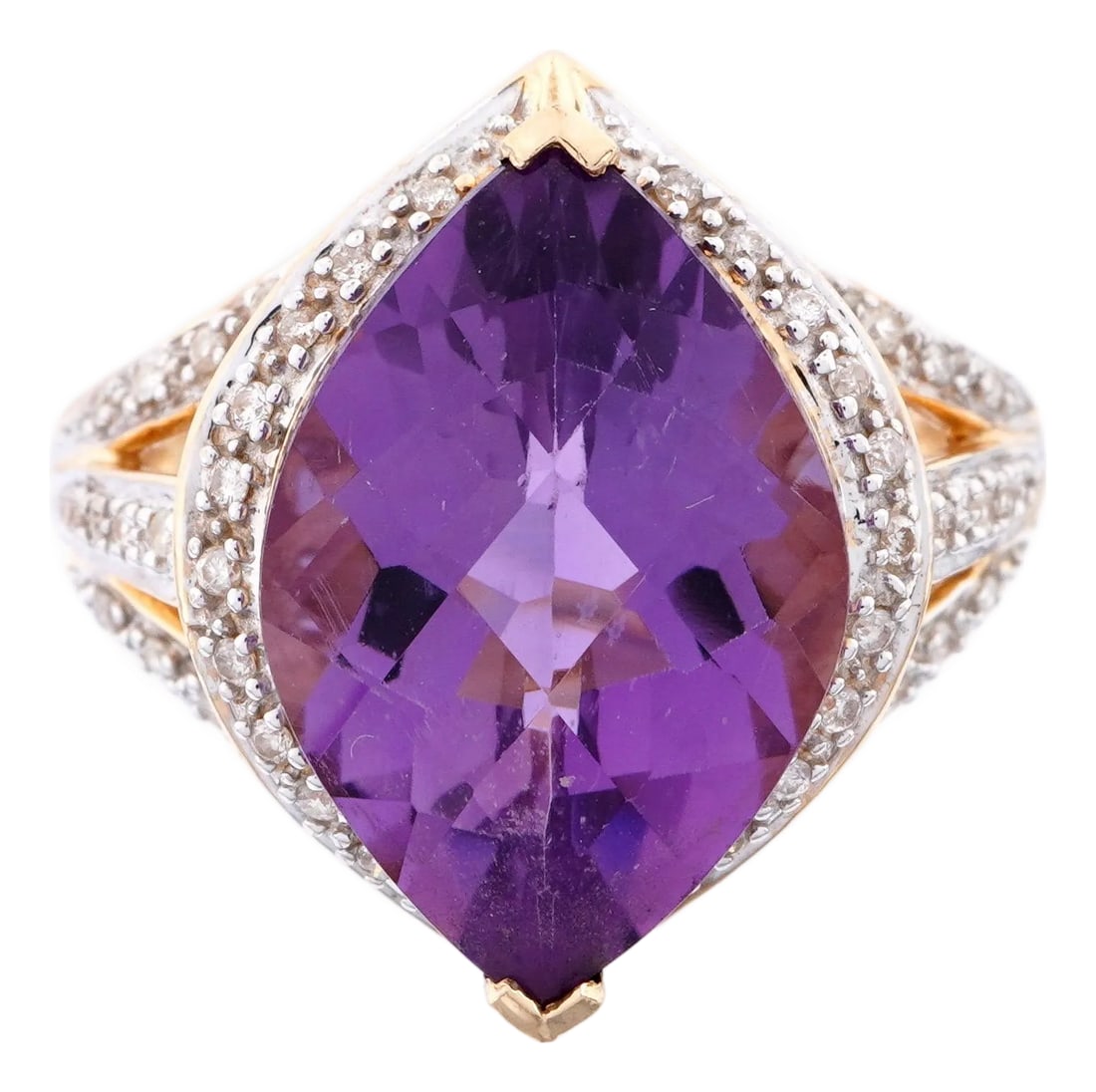 14k Gold Vintage Amethyst and Diamond Cocktail Ring: Vintage 14K Gold Purple Amethyst and Diamond Cocktail Ring, size 7.5. Ring features a dramatic faceted amethyst set in warm yellow gold, accented by sparkling white diamonds. The center amethyst