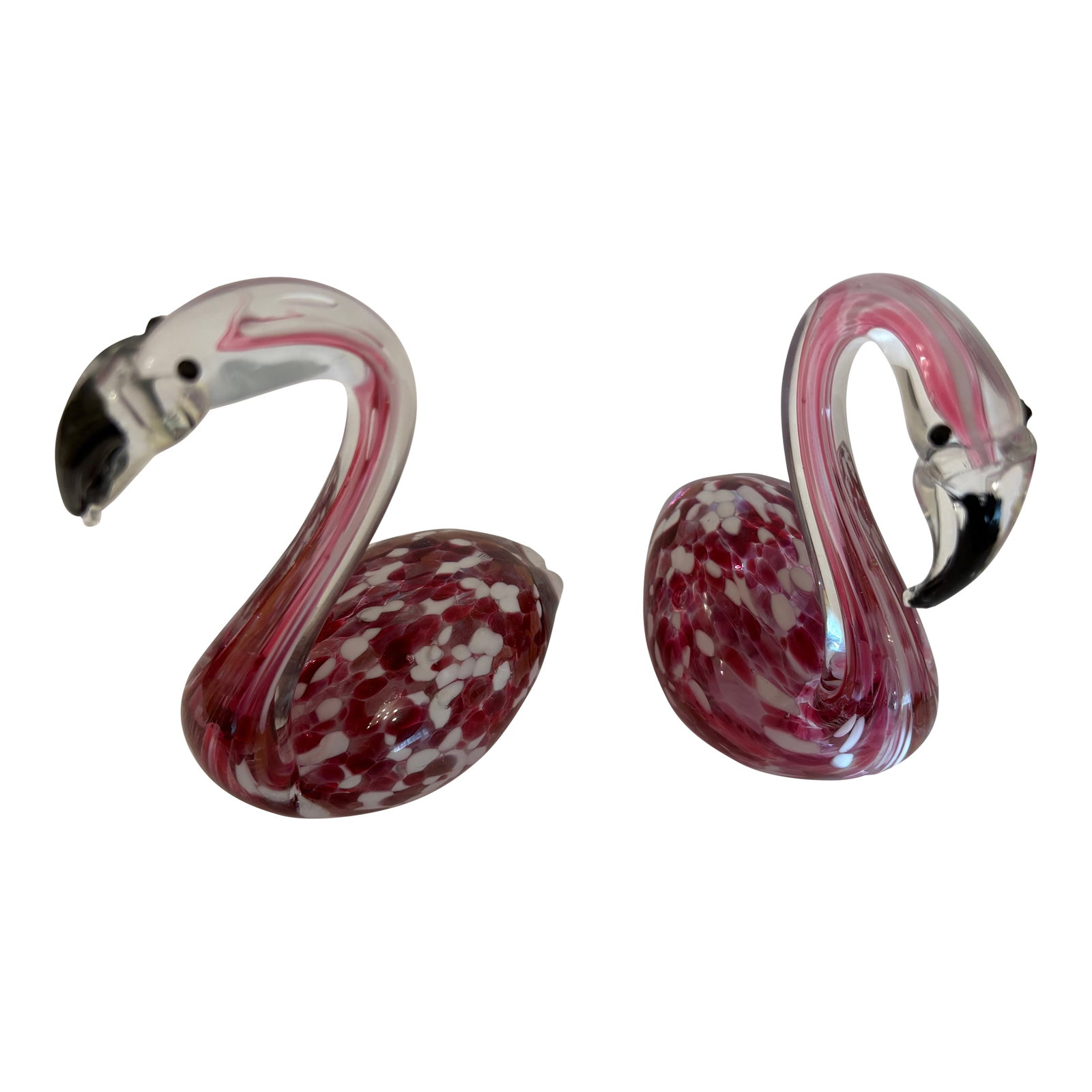 Murano Vintage Hand Blown Glass Flamingos, a Pair: These Murano vintage hand blown glass pink and white flamingos with black beaks featured here. They are sold as a pair and stand at 6.5" high, 2.5" wide and 4" deep. They were assumumingly made in