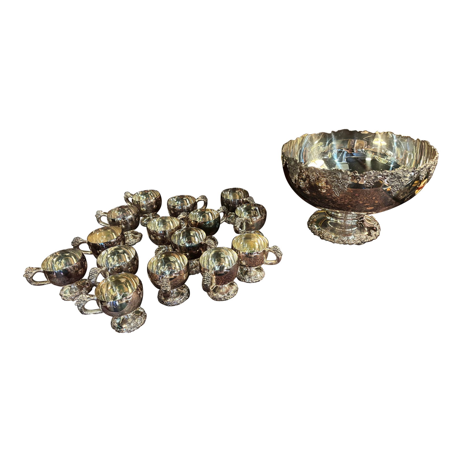 Vintage Webster Wilcox Silver Plate Punch Bowl Set, 16-Piece Grapevine Pattern, Large Bowl + 15 Cups: A striking vintage silver plate punch service by Webster Wilcox, beautifully executed in an ornate grapevine pattern that wraps each piece in richly cast detail. The sculptural handles and bases