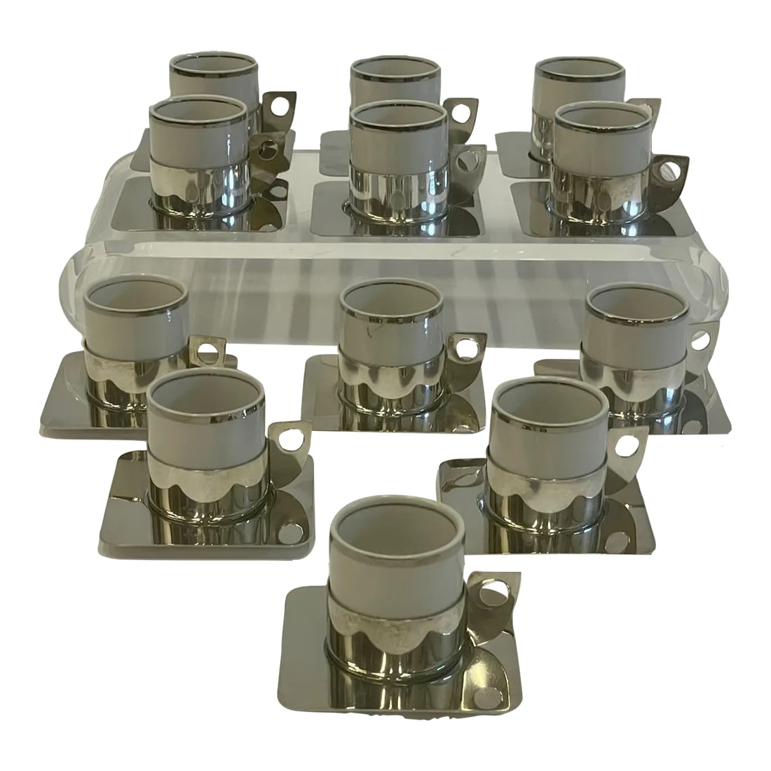 Brazilian Silverplate & Porcelain Demitasse Cups & Saucers -Set of 12: Stylish set of 12 demitasse cups and saucers having a mix of silver plate and white porcelain. Cups are 2" round while saucers are 3.25 square. We love the fabulous sophisticated design of the