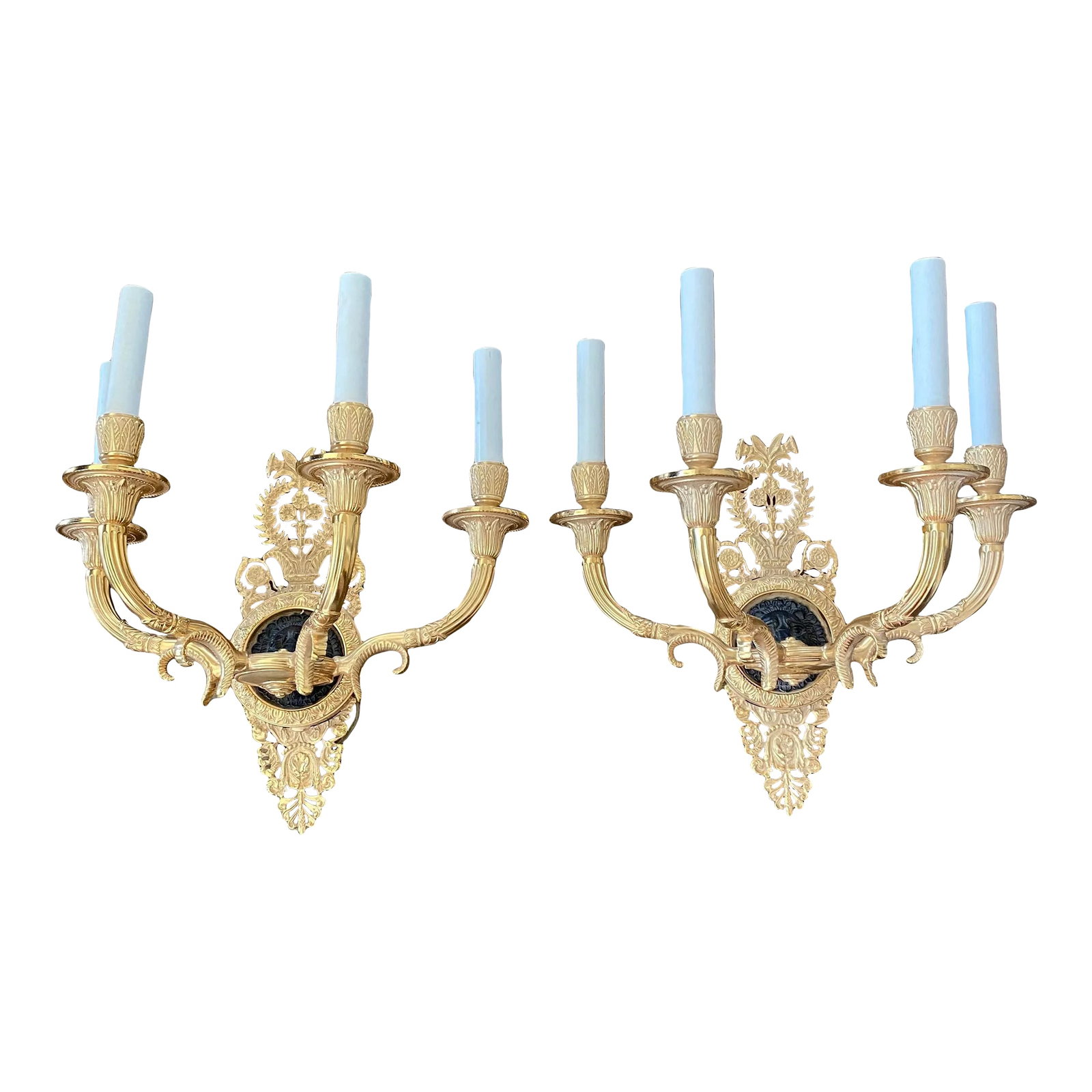 4 Arm French Empire Style Brass Wall Sconces With Lions Heads -A Pair: Elegant refined pair of Empire style, French brass sconces having intricate detail on the 4 shaped arms. The lion heads sit on a black enameled circular base. The pie`ce de reÂ´sistance to