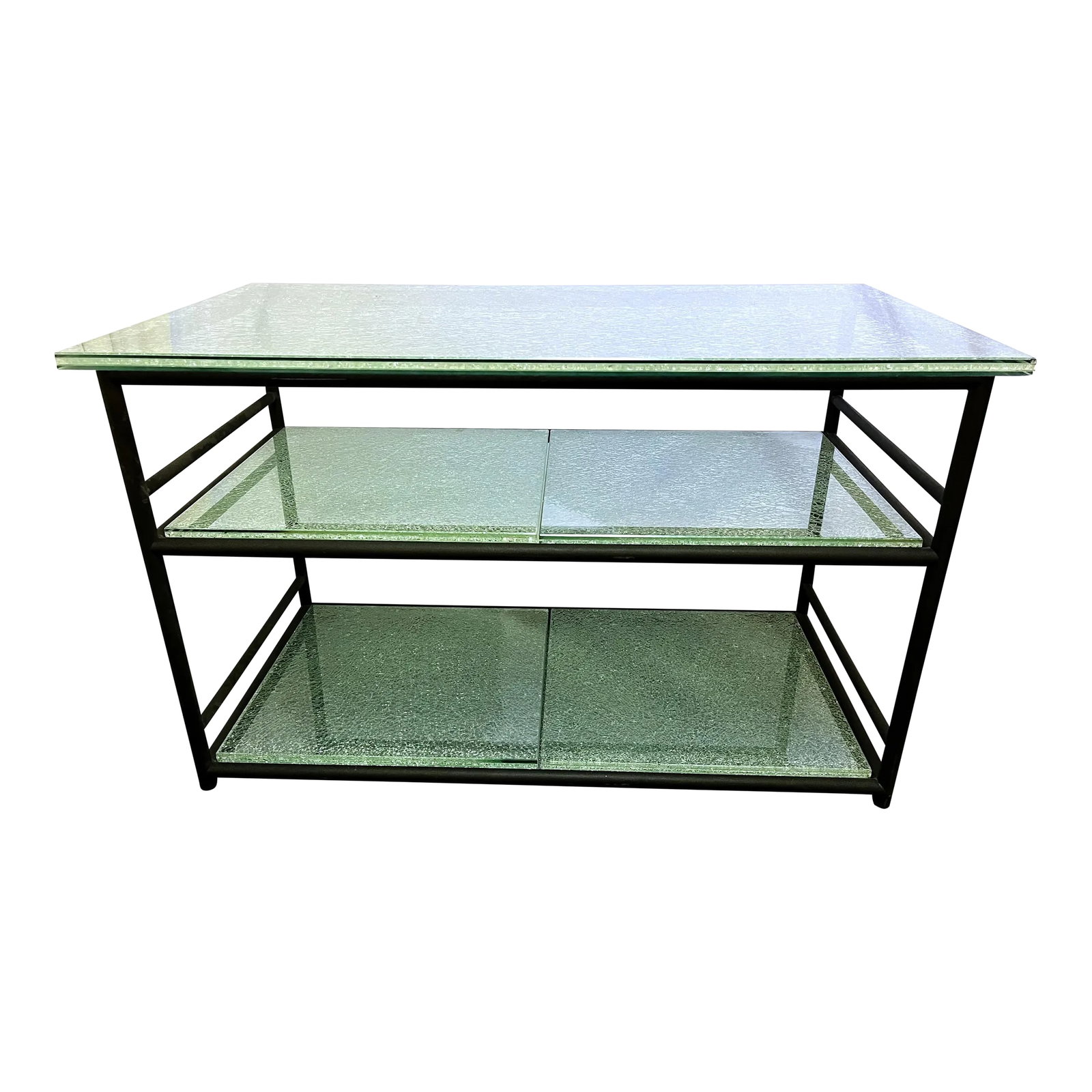 Miami Modern Style Thick Crackle Glass Table With Shelves: Sleek Miami Modern style table with shelves. This very solid piece is made with 3/4" crackle glass with green undertones. The glass sits on a heavy metal powdercoated black metal base. The versatile