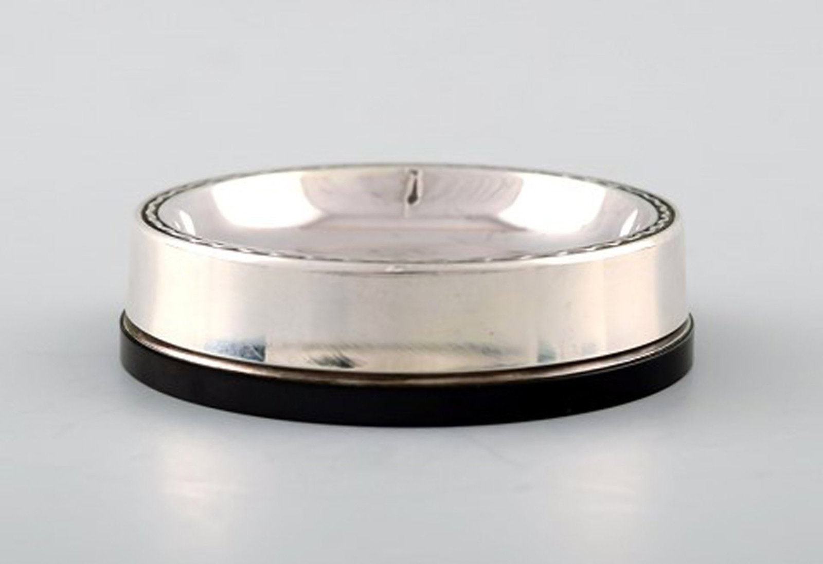 Vera Ferngren for GAB, Sweden. Three coasters in silver and bakelite. - 2