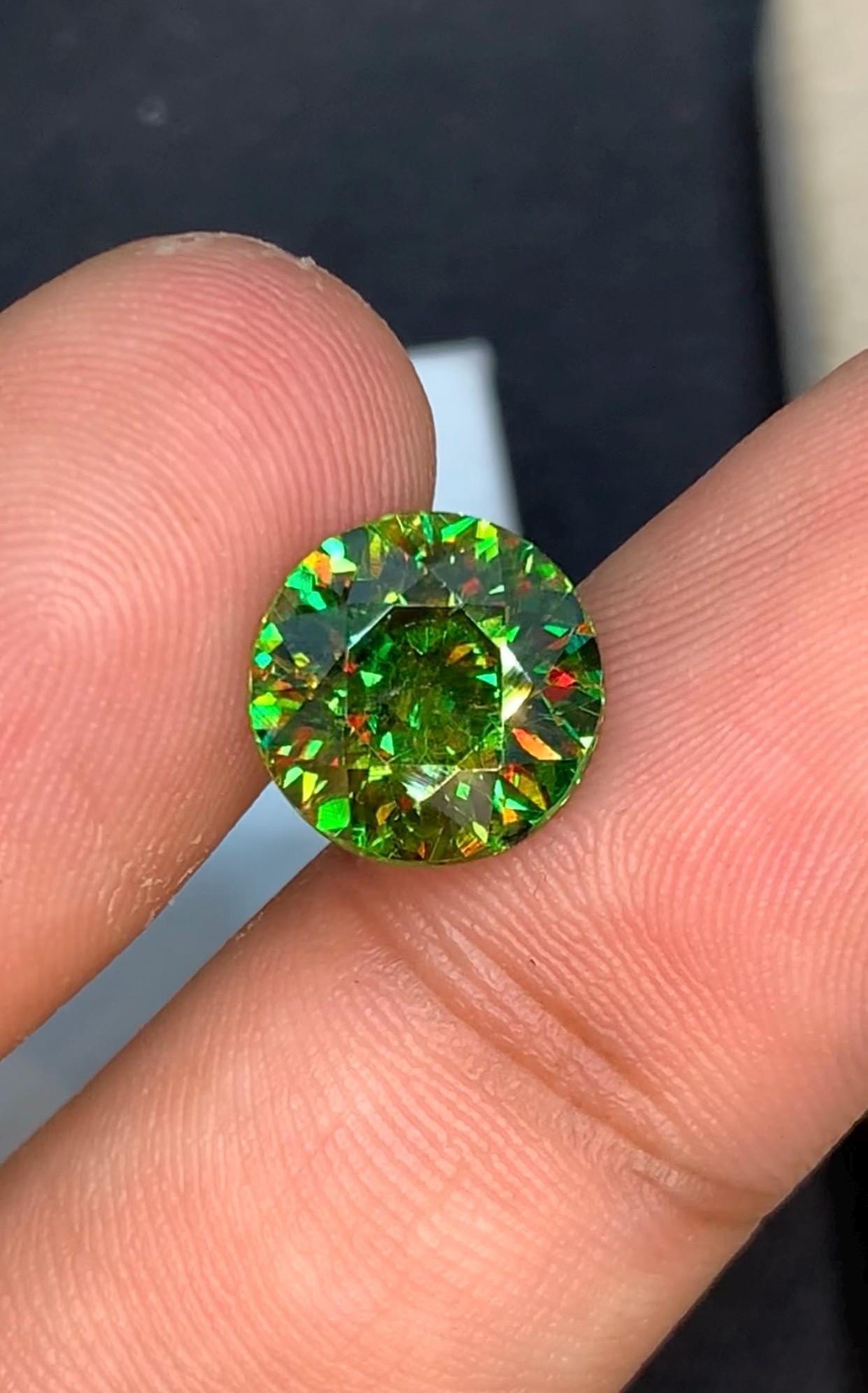 Natural Chrome Green Sphene Gemstone, Brilliant Round Cut, Skardu Origin, 3.90 Carat: Specifications: * Gemstone Name: Chrome Green Sphene (Titanite) * Carat Weight: 3.90 Carat * Dimensions:10.8 x 10.8 x 5.9 mm * Origin: Skardu, Gilgit-Baltistan, Pakistan * Color: Chrome Green With Yel