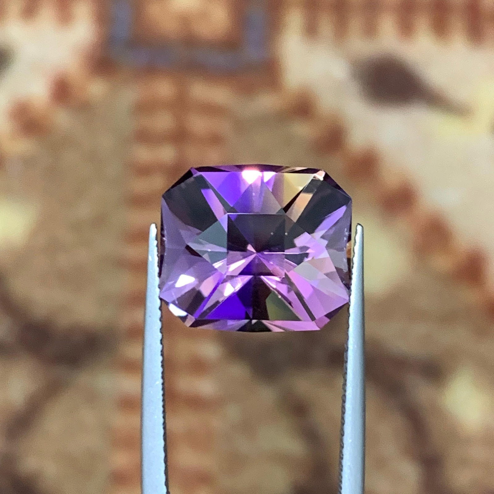 Bi-Color Ametrine Gemstone: 12.80 Carat Fancy Cut Loupe Clean: Gemology: * Weight : 12.80 carat * Dimension : 14.8*12.9*11.1 mm * Color: Yellow, Purple * Clarity : Loupe Clean * Shape : Fancy Cut * Hardness : 7 - 7.5 * Mineral Class : Quartz * Mine: Anahi Mine *