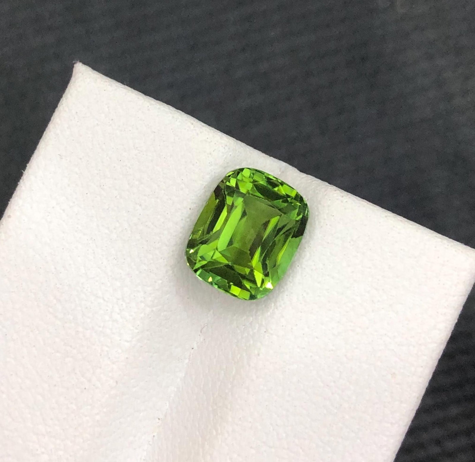 Forest Green Tourmaline Gemstone: 3.07 CT Cushion Cut, Afghanistan: Weight : 3.07 CT Dimensions : 8.8 X 7.2 X 6.10 MM Shape : Cushion Clarity : Loupe Clean Color : Forest Green Treatment : None Origin : Afghanistan Hardness : 7.5-8 Family : Elbaite SKU : A * Worldwide