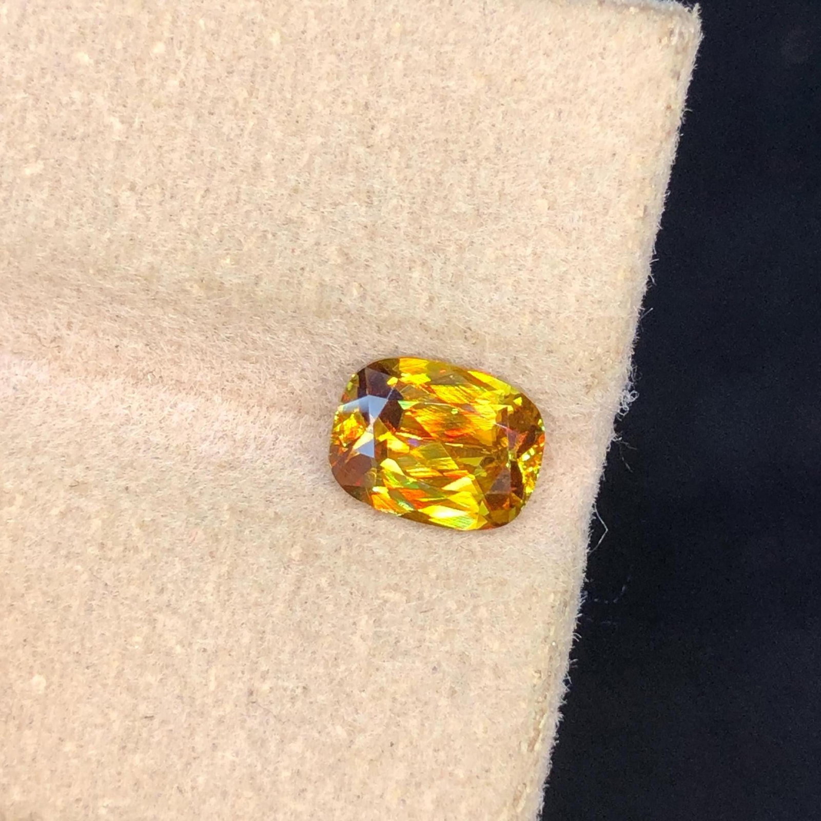Natural Sparkling Fire Sphene Titanite Cushion Cut Gemstone For Ring And Jewellery - 1.23 Carat: Gemstone Details: Gemstone: Sparkling Sphene Titanite Dimensions: 7.2*5.9*3.4 mm Weight: 1.23 Carat Cut: Cushion Color: Yellow Clarity: Eye Clean Origin : Skardu Pakistan Treatment: None Mineral Class