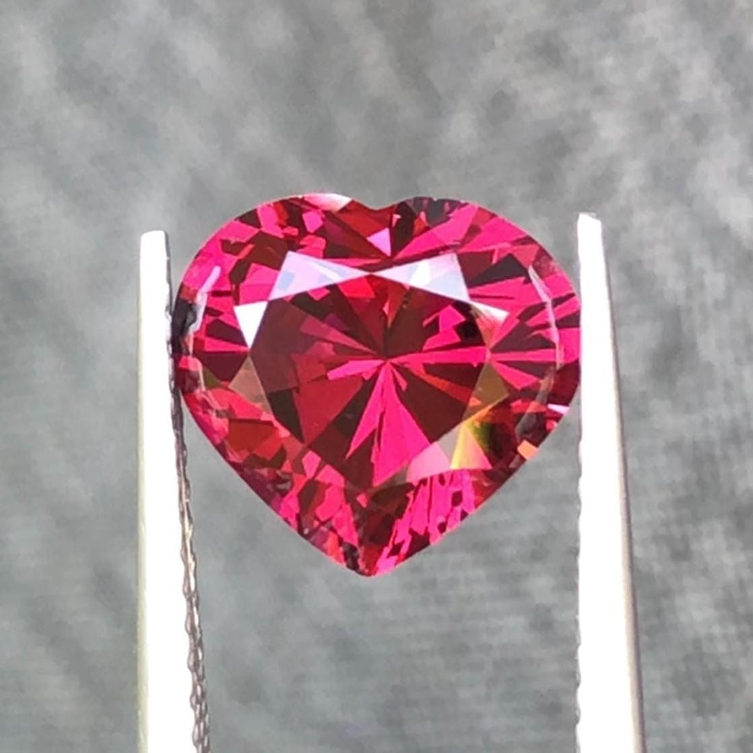 Natural Pinkish Garnet Gemstone Heart Shape For Jewellry making From Tanzania - 3.355 Carat: Gemology: * Weight : 3.355 Carat * Dimension :8.7*9.5*5.9 mm * Origin : Tanzania * Colour: Pinkish * Clarity : Loupe Clean * Shape : Square Cushion Cut * Hardness : 6.5 -7.5 * Luster : Vitreous *
