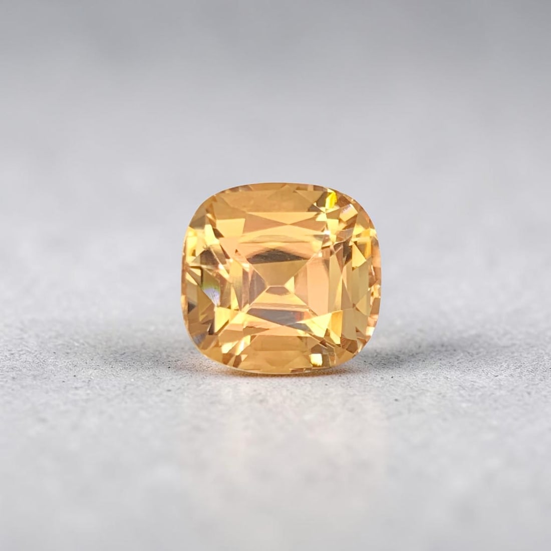 Sunset Yellow Tourmaline Ring Stone, Natural Tourmaline Loose Gemstone: Sunset Yellow Tourmaline Ring Stone, Natural Tourmaline Loose Gemstone Weight (CT) : 4.65 Measurements(MM) : 10 x 9 x 8 Shape : Cushion Color : Sunset Yellow Treatment : None Clarity : Eye Clean