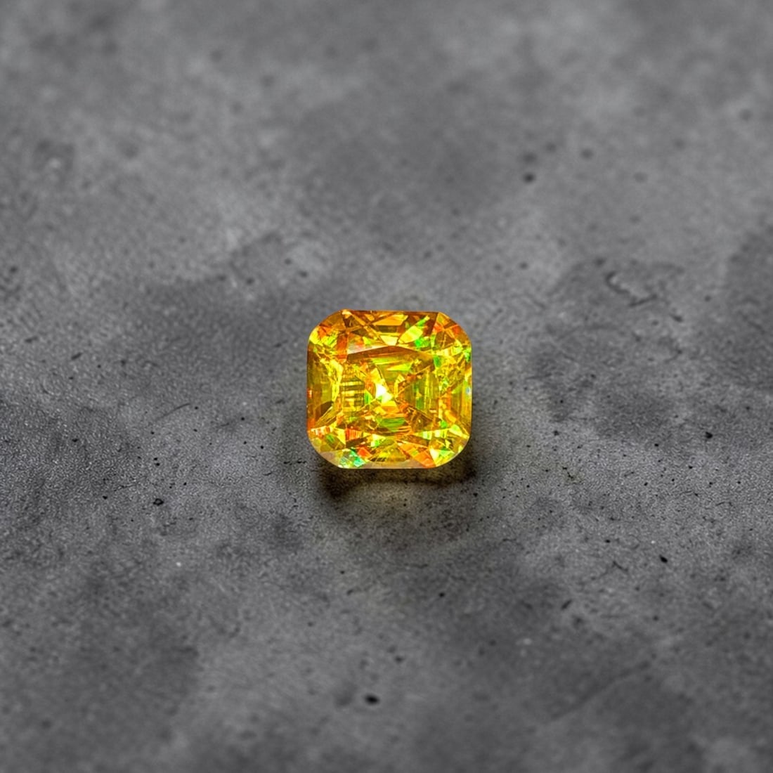 Full Fire Sphene Ring Stone, Yellow Sphene Titanite Gemstone For Jewelry: Full Fire Sphene Ring Stone, Yellow Sphene Titanite Gemstone For Jewelry Weight (CT) : 1.30 Measurements(MM) : 6 x 6 x 4 Shape : Cushion Color : Greenish Yellow (Fire) Treatment : None Clarity : VVS O