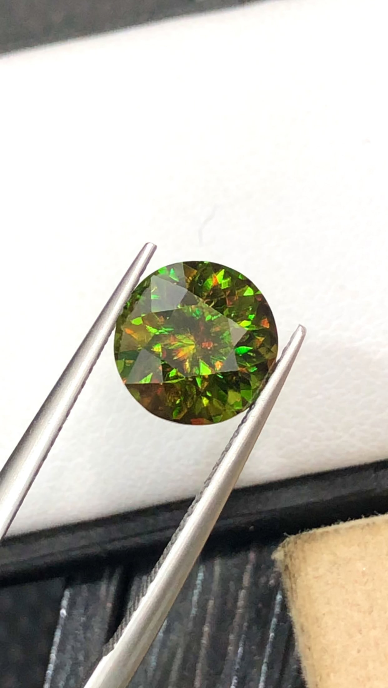 3.090 Carats Round Diamond Cut Natural Chrome Sphene Titanite Gemstone: Chrome sphene is rarest and most valuable. In general, lighter colors (namely green, yellow, and light orange) will carry greater value than even rich hues because pale colors display the stone's disp