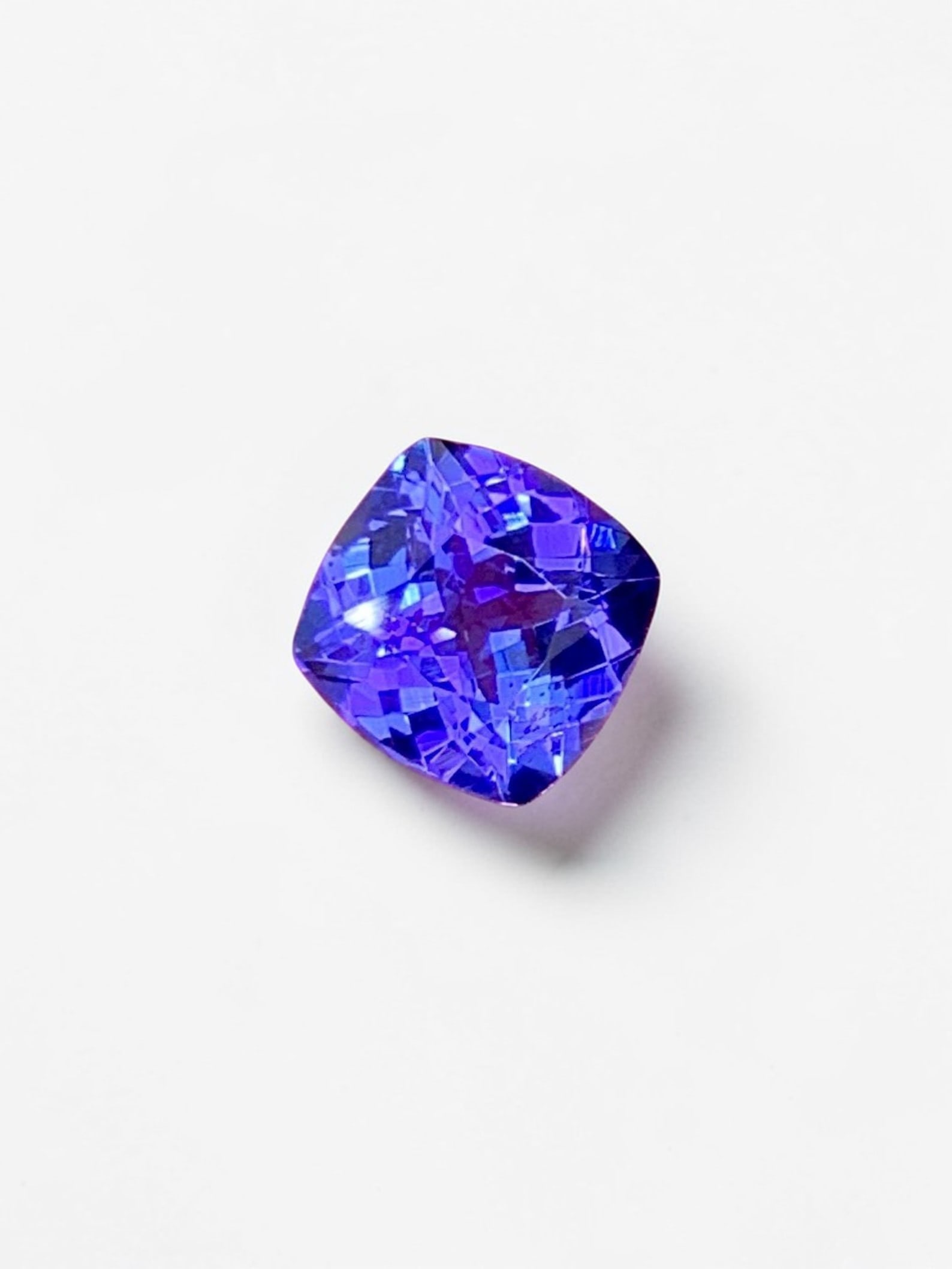Royal Blue Tanzanite Gemstone, AAA Cushion Cut, 1.05 Carats: Royal Blue Tanzanite Gemstone, AAA Cushion Cut, 1.05 Carats Weight : 1.05 CTS Size : 06 x 06 x 3.8 mm Origin : Tanzania Cut : Square Cushion Cut Birthstone : December Hardness : 6 - 6.5 Clarity :
