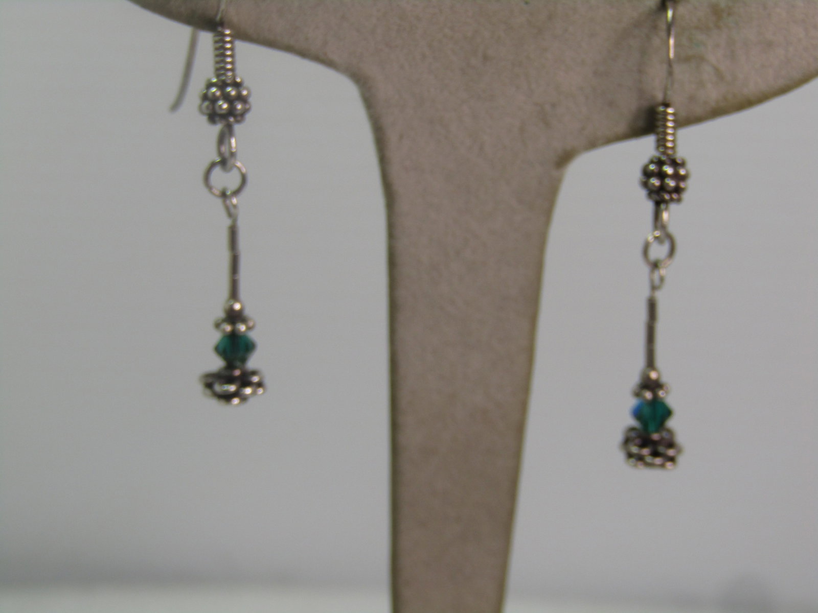 Vintage Sterling Green Crystal Earrings, Drop/Dangle, 1990's.: Vintage Sterling Green Crystal Earrings, Drop/Dangle, 1990's. These are marked .925 and test as sterling with a weight of appx. 2.94 grams. They have an emerald greentone crystal bead with a beded