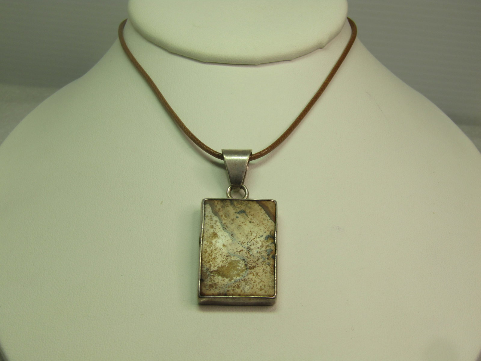 Vintage Sterling Agate Brooch on 20" Cord Necklace, 1990's, Southwestern Vibe: Vintage Sterling Agate Brooch on 20" Cord Necklace, 1990's. Southwestern vibe. Rectangular brown agate with wide swing bail. The agate is appx. 1,25" tall and 7/8" wide. The length with the bail is