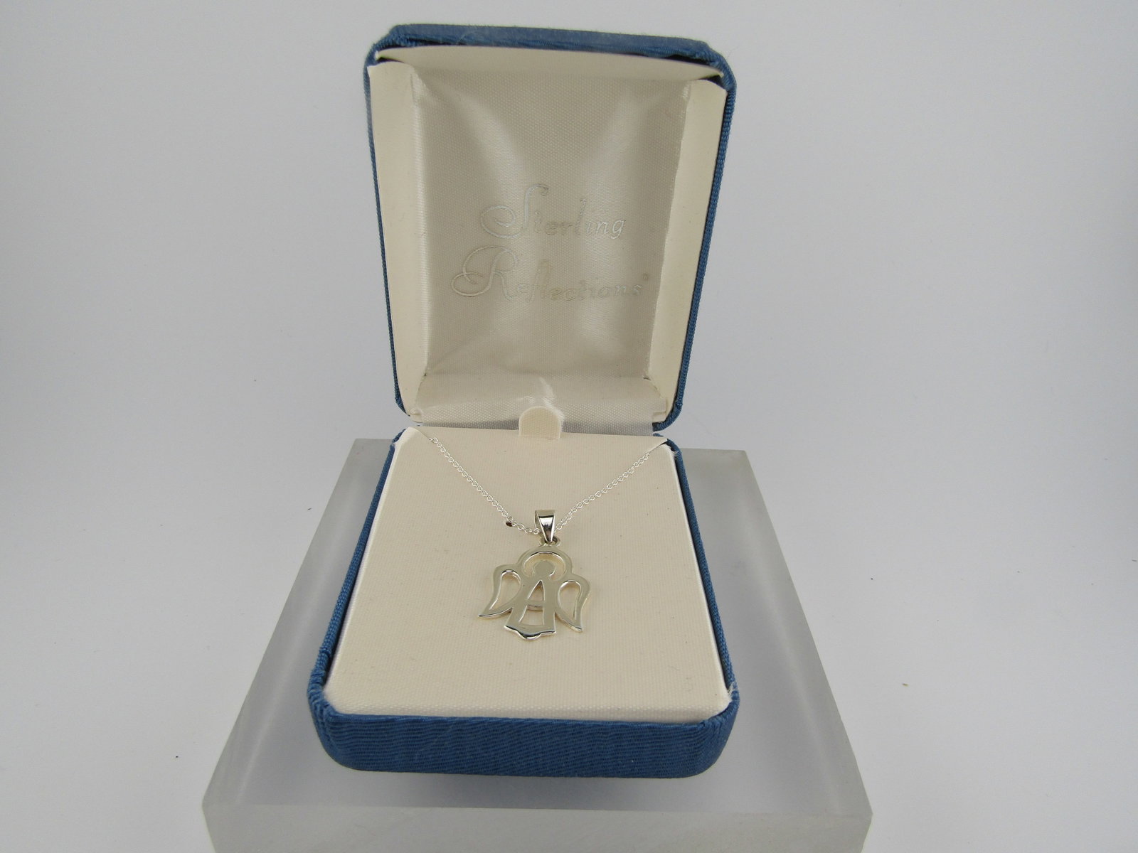 Sterling Angel Necklace, 18", Original Box, Silver Reflections, 1980's-1990's: Sterling Angel Necklace, 18", Original Box, Silver Reflections, 1980's-1990's. This is marked .925 on the pendant and at the spring ring clasp of the chain. It tests as sterling; however, the chain