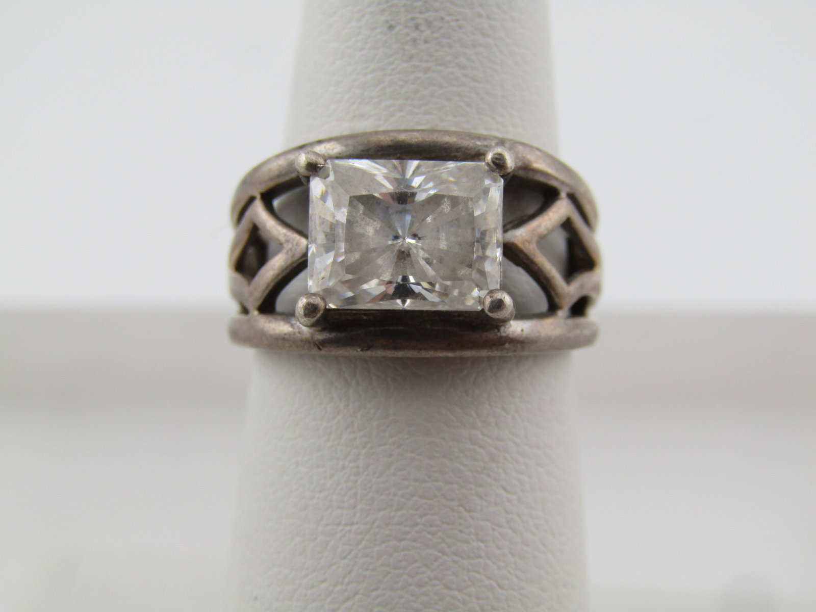 Vintage Sterling Rectangular Clear Stone Ring, Sz. 6, Wide, 1970's-1980's: Vintage Sterling Rectangular Clear Stone Ring, Sz. 6, Wide, 1970's-1980's. This has a wide angular open work design on the top half of the ring that is appx. 11mm at top center and tapers to appx.