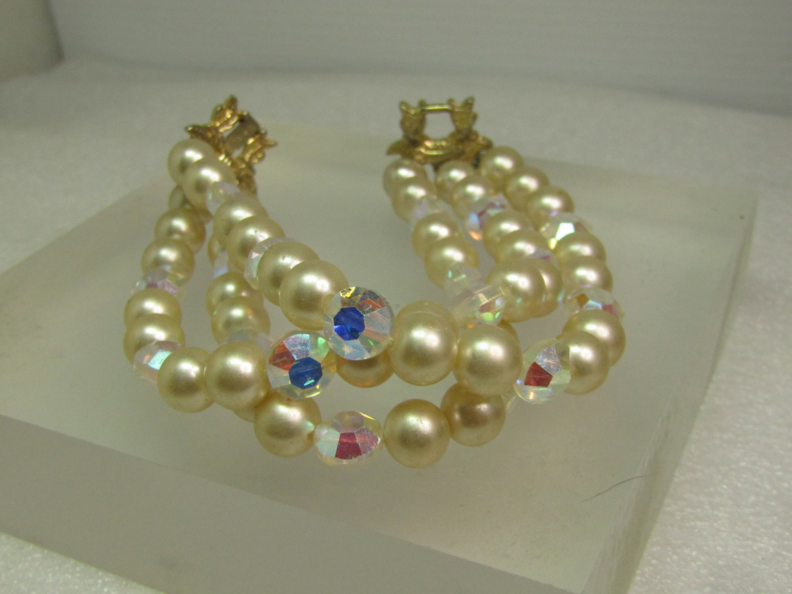 Vintage Triple Strand Faux Pearl Bracelet, AB Glass Beads, Signed Marvella. 1960's - 2