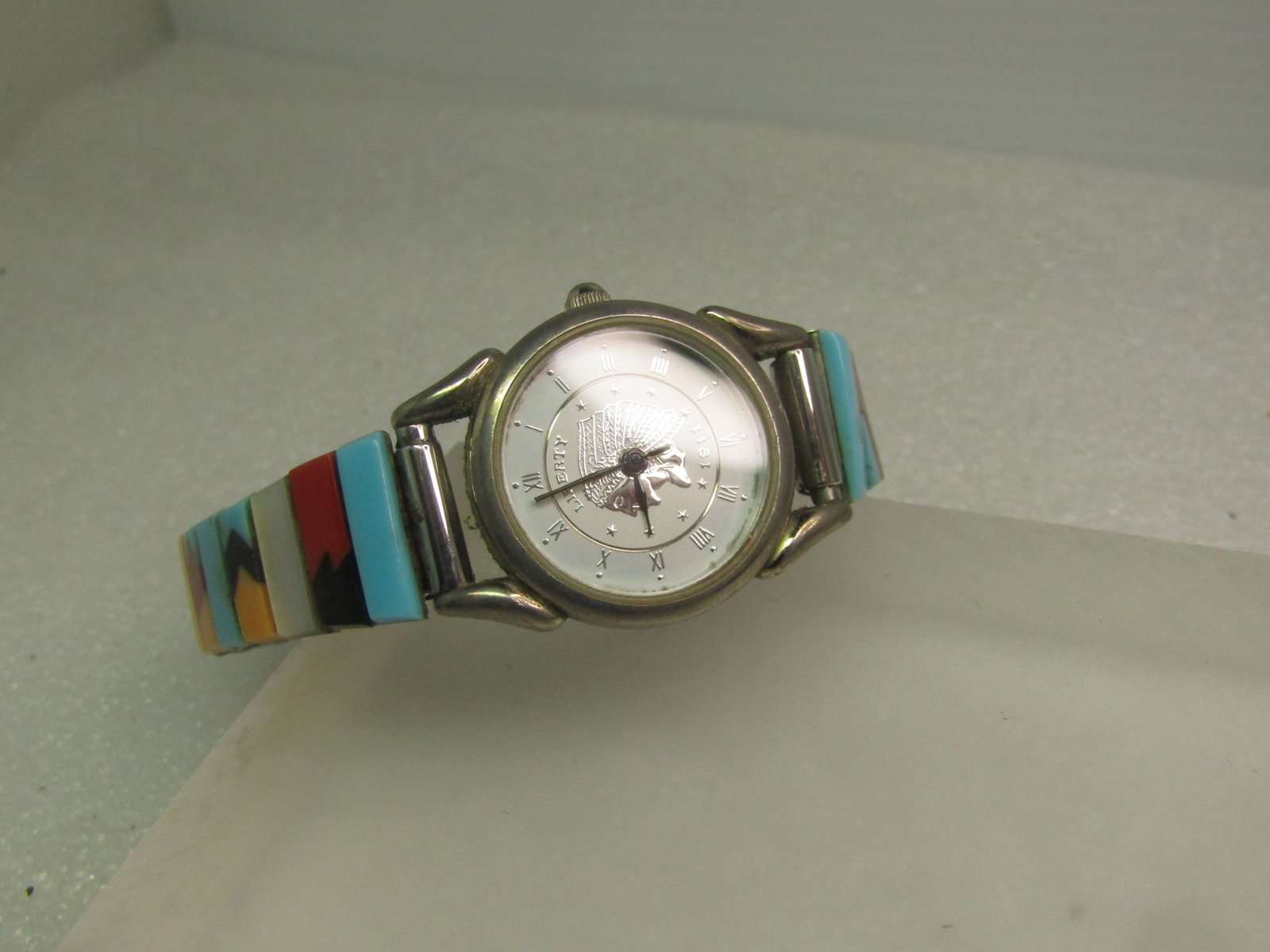 Vintage Southwest Traditions Faux Turquoise Watch Band/Liberty Watch, 1980's-1990's: Vintage Southwestern Faux Turquoise Watch Band/Liberty Watch, 1980's-1990's. Silver tone stretch watch and bracelet with the band being made of faux stones such as turquoise, carnelian,