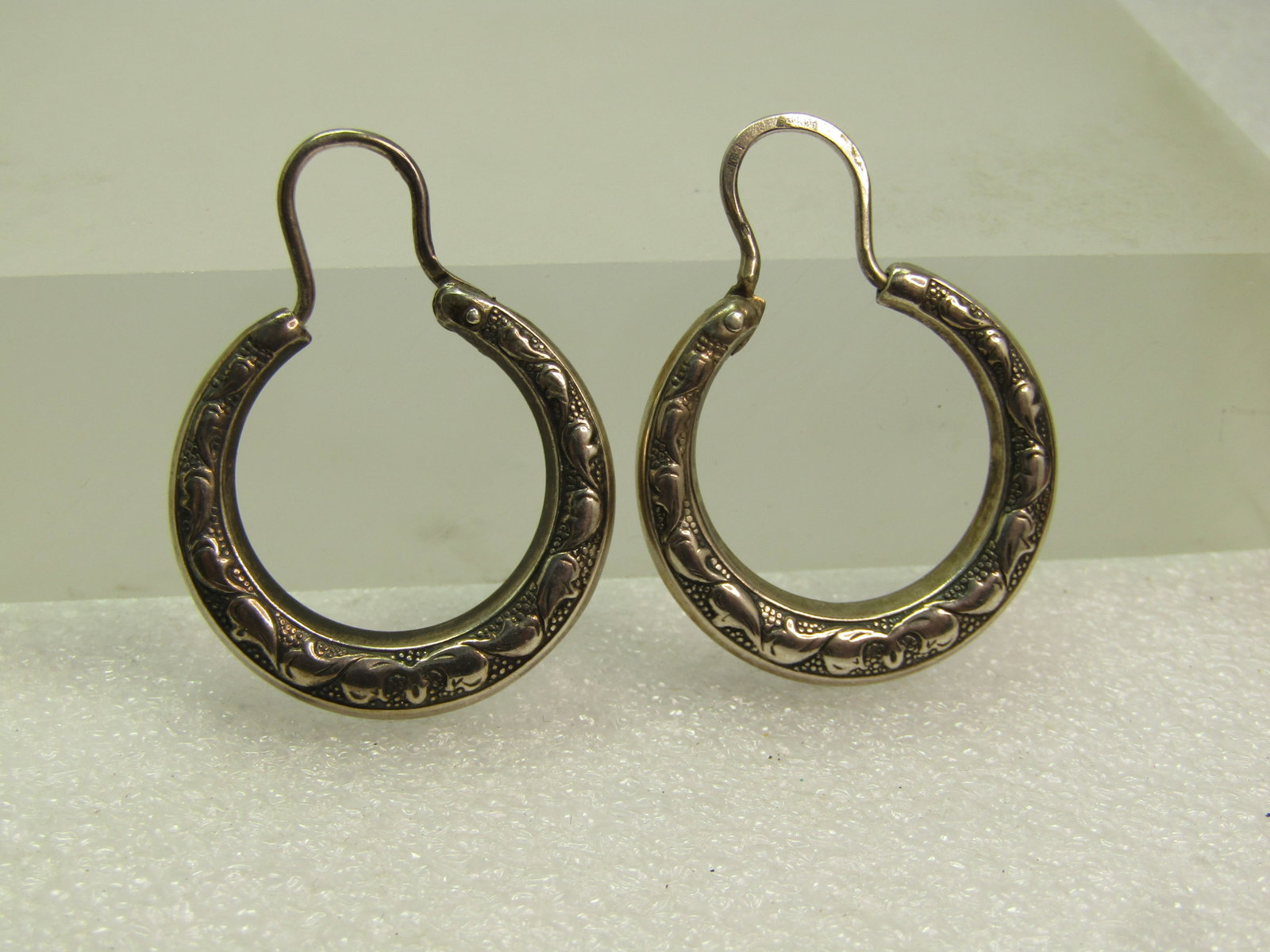 Vintage Sterling Hoop Pierced Earrings, Signed/Mark, 1970's-1980's: Vintage Sterling Hoop Pierced Earrings, Signed/Mark, age is estimated at 1970's-1980's. These earrings are quality made and believed to be made not in the USA. They have a mark that looks like a Russi