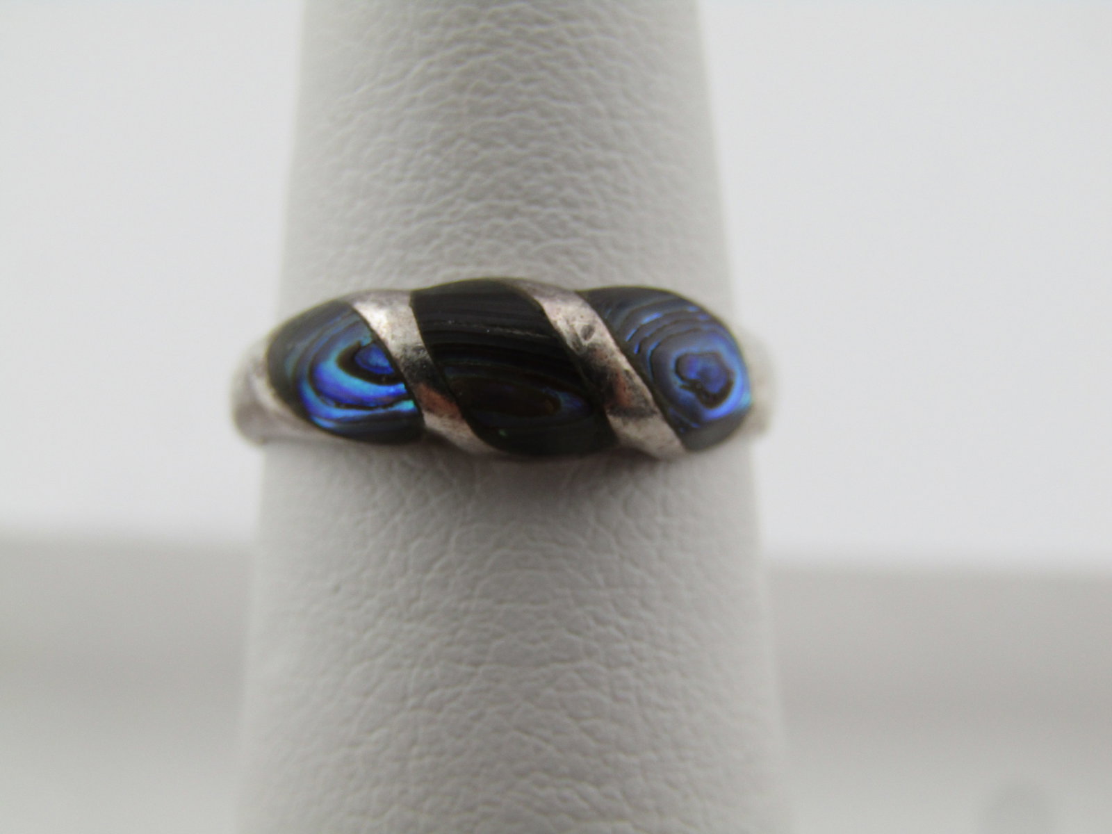 Vintage Sterling Inlaid Abalone/Paua Ring, Sz. 4.5, 1970's-1980's: Vintage Sterling Inlaid Abalone/Paua Ring, Sz. 4.5, 1970's-1980's. This ring is domed over top with sections of domed deep blue abalone/paua shell setting in an all sterling ring. It is marked with a 