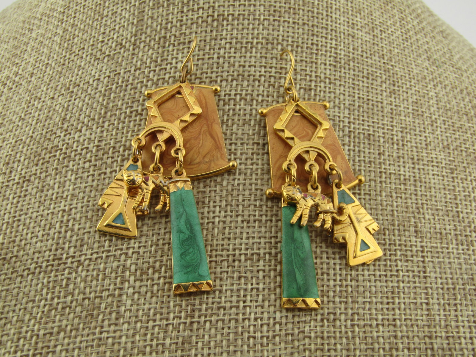 Vintage Enameled Egyptian Themed Drop Earrings, with Cat, Edgar Berebi, 1980's: Vintage Enameled Egyptian Themed Drop Earrings, with Cat, Edgar Berebi, 1980's. Pierced Earrings. Layered drops of a rectangular tan swirl enameled main drop and then open ridged frame from which ther