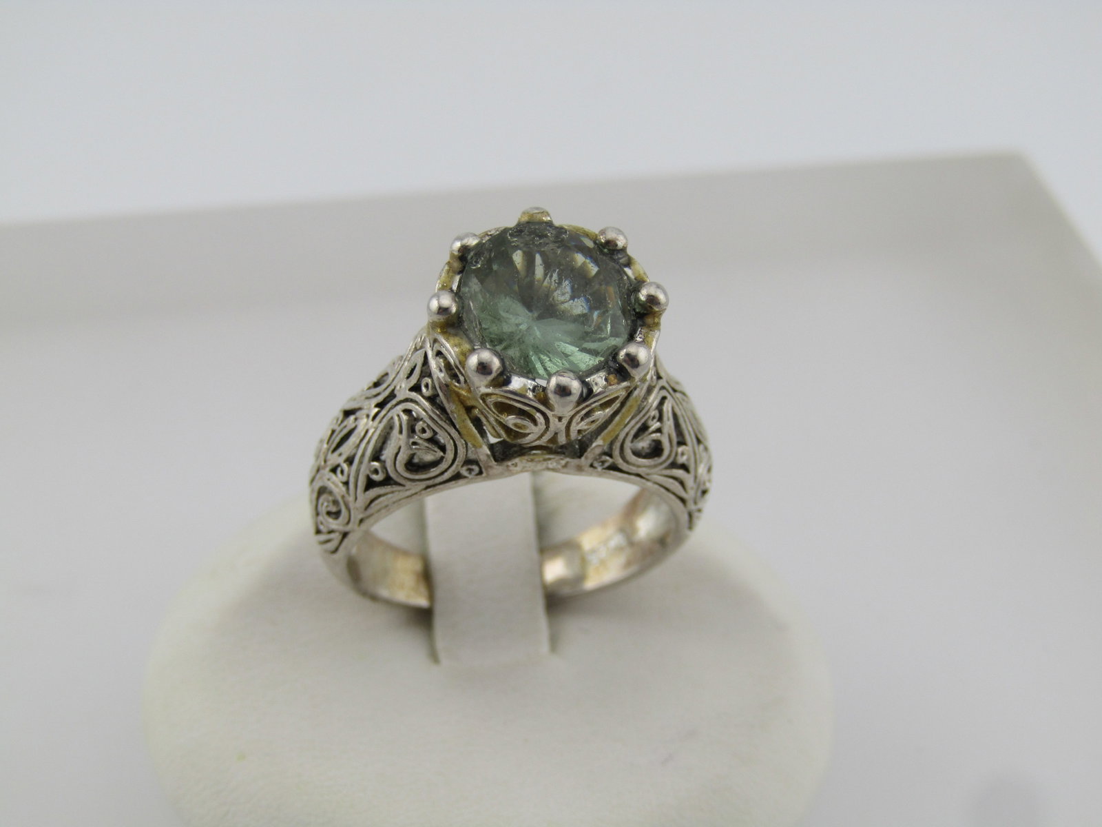 Vintage Green Stone Antique Themed Ring, Sz. 8, Silver Tone, 1980's-1990's: Vintage Green Stone Antique Themed Ring, Sz. 8, 1980's-1990's. Silver Tone with an old world style setting with filigree and scroll work. The green stone is round and appx. 9.2mm. The stone looks