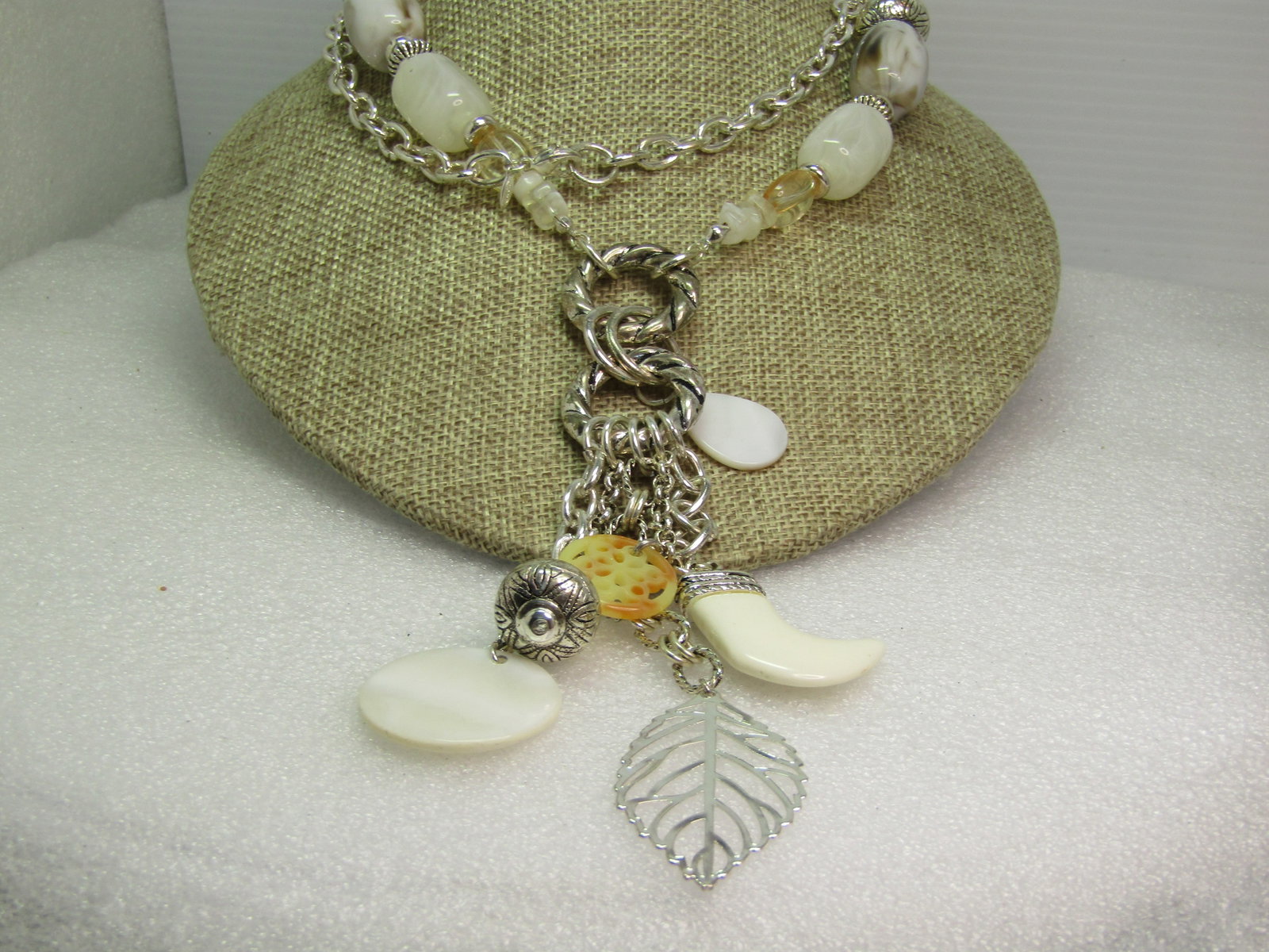 Vintage Avon Faux Agate, Leaf/Italian Horn Necklace, 30", 1980's-1990's: Vintage Avon Faux Agate, Leaf/Italian Horn Necklace, 30", 1980's-1990's. Silver tone with a mix of southesstern-ish silver tone beads mixed with faux whote and gray agate and carved blossom