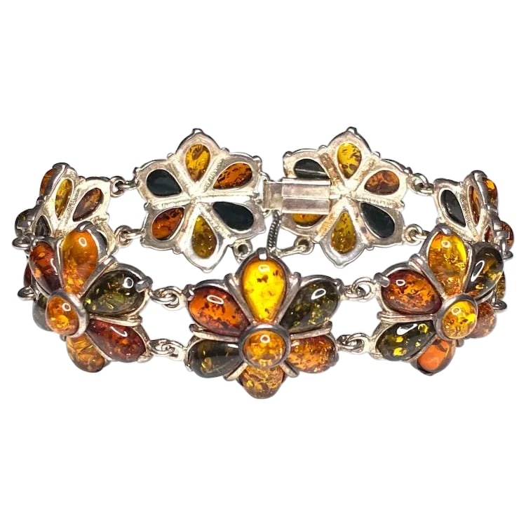 Vintage Sterling Silver Muticolored Baltic Amber Flower Bracelet: Title: Vintage Sterling Silver Muticolored Baltic Amber Flower Bracelet Description: Vintage Sterling Silver Muticolored Baltic Amber Flower Bracelet Hallmarked: Poland v-8 925 Weighs: 31 grams