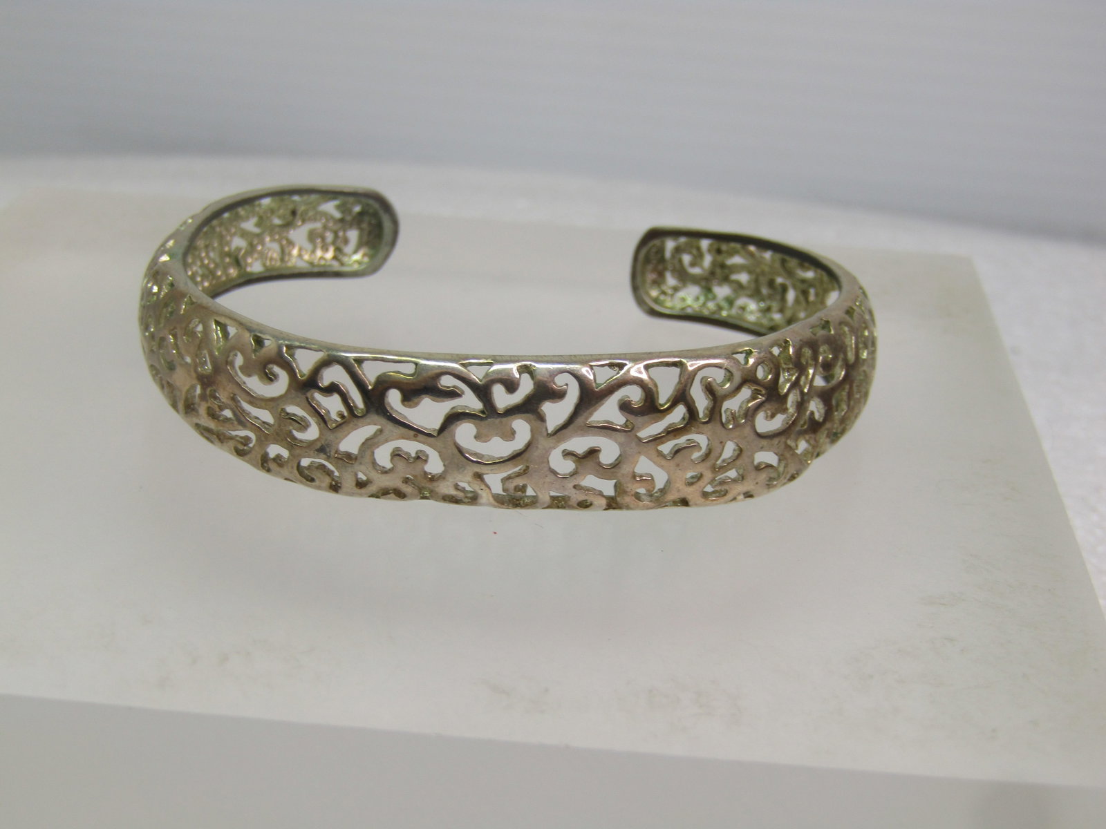 Vintage Silver Tone Filigree Cuff Bracelet, 6.5", 1980's-1990's: Silver Tone Foxtail Link Bracelet, 7.5", 4.5mm, 1990's-after. This has a bright silver plated finish. It is marked .925 but it is magnetic and does not test as sterling. It is in vintage new condition