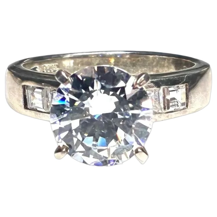 Estate Sterling SIlver Engagement Ring: Title: Estate Sterling SIlver Engagement Ring Description: Estate Sterling SIlver CZ Engagement Ring Hallmarked: 925 Thailand Weighs: 4.82 gram US Ring Size: 6 Date/Period: Estate Materials: Hallmarke