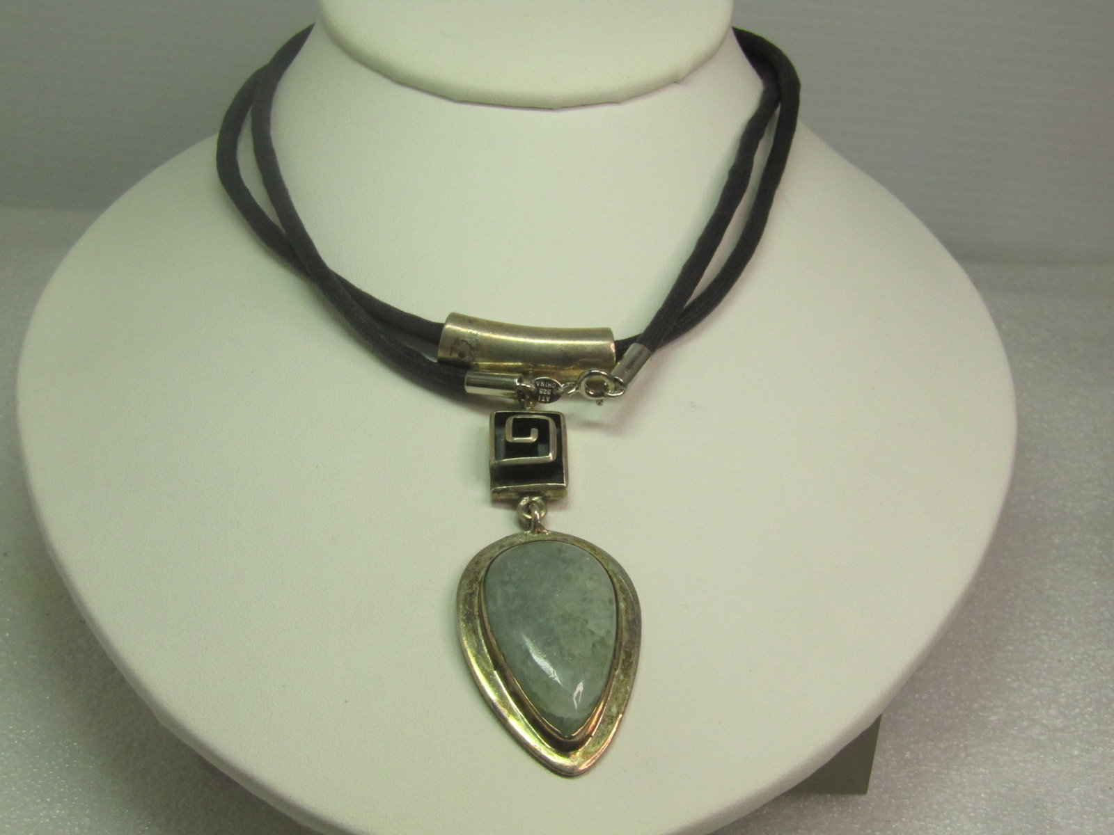 Vintage Sterling Aventurine Pendant/Necklace, 30", 1980's-1990's,Southwestern/Mixed Genre: Vintage Sterling Aventurine Pendant/Necklace, 30", 1980's-1990's,Southwestern. This has the meander symbol (similar to a Greek Key symbol) between wide curved slide bail and the bezel-set aventurine p