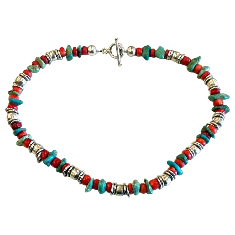 Vintage Handmade Navajo Sterling Silver Turquoise and Coral Necklace: Title: Vintage Handmade Navajo Sterling Silver Turquoise and Coral Necklace Description: Vintage Handmade Navajo Sterling Silver Turquoise and Coral Necklace Hallmarked: 925 Weighs: 62 grams Measures 