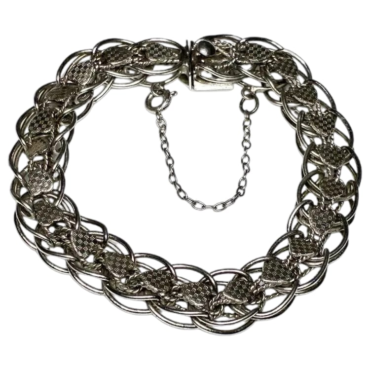 Vintage Trebor Sterling Silver Etched Heart Charm Bracelet with Safety Chain: Title: Vintage Trebor Sterling Silver Etched Heart Charm Bracelet with Safety Chain Description: Vintage Trebor Sterling Silver Etched Heart Charm Bracelet with Safety Chain Hallmarked: Trebor Sterlin
