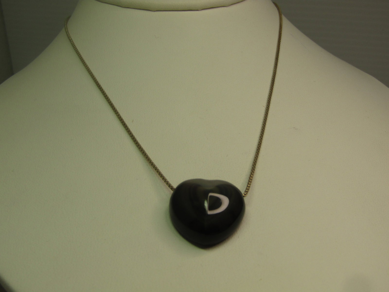 Vintage Sterling Black Glass Moonstone Concentric Heart Necklace, 18", 1990's.: Vintage Sterling Black Glass Moonstone Concentric Heart Necklace, 18", 1990's. This has a black glas stone that looks like a cross between moonstone and hematite. On the top is has concentric heart de