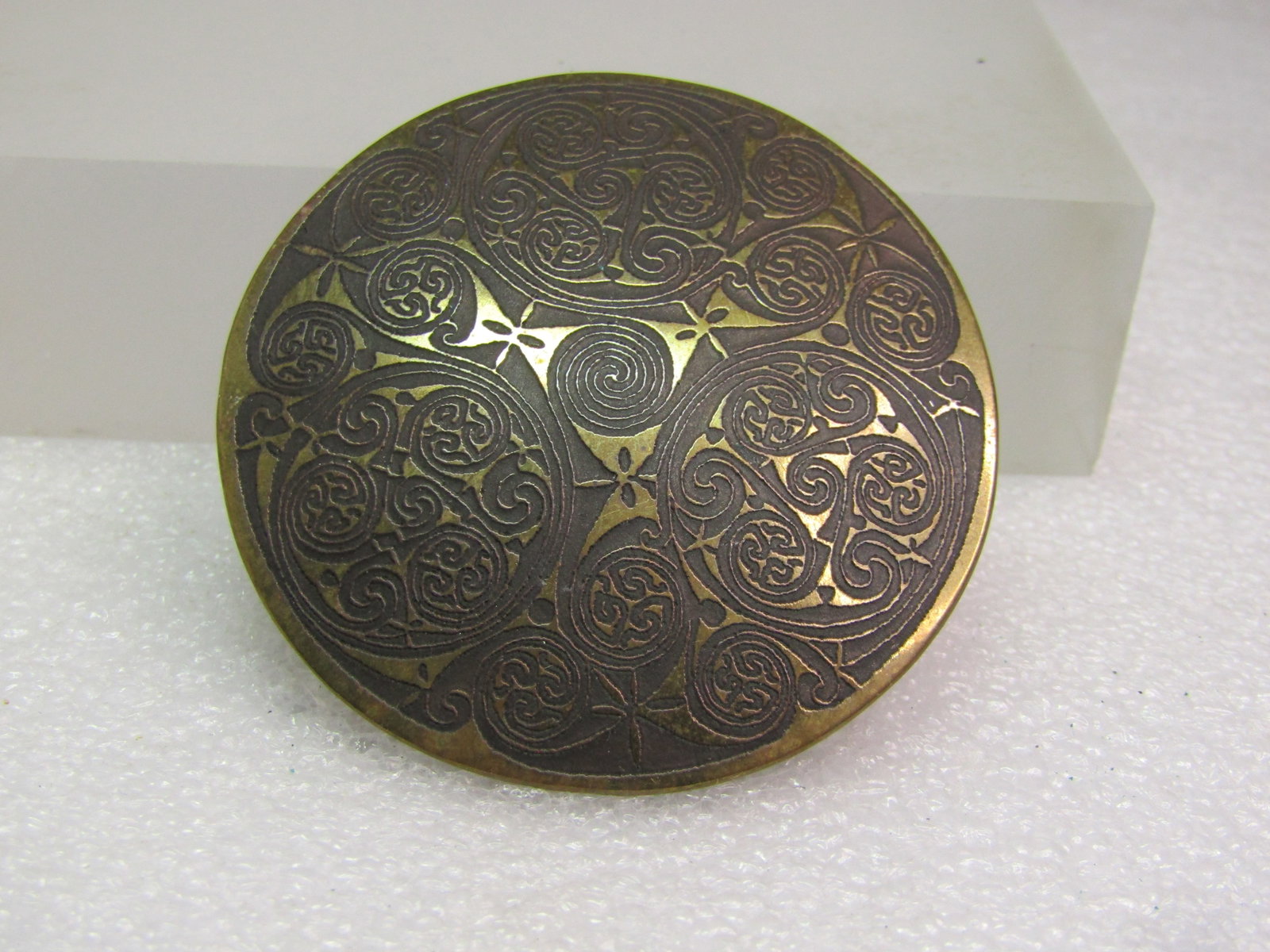 Vintage Domed Carved Brass Brooch, Intricate, 1970's-1980's, Celtic?: Vintage Domed Carved Brass Brooch, Intricate, 1970's-1980's, Celtic? This is slightly domed and is appx. 2" across. It is not marked or signed. I've seen similar listed as Celtic - not sure it is but