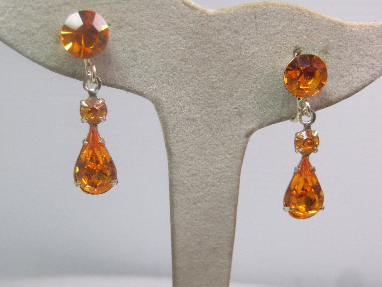 Vintage Orange Rhinestone Stud/Drop Earrings, Screwback, 1960's-1980's: Vintage Orange Rhinestone Stud/Drop Earrings, Screwback, 1960's-1980's. These have an appx. 8mm round stud with a 4mm round drop and a pear-shaped drop that is appx. 12mm by 8mm. The earrings are