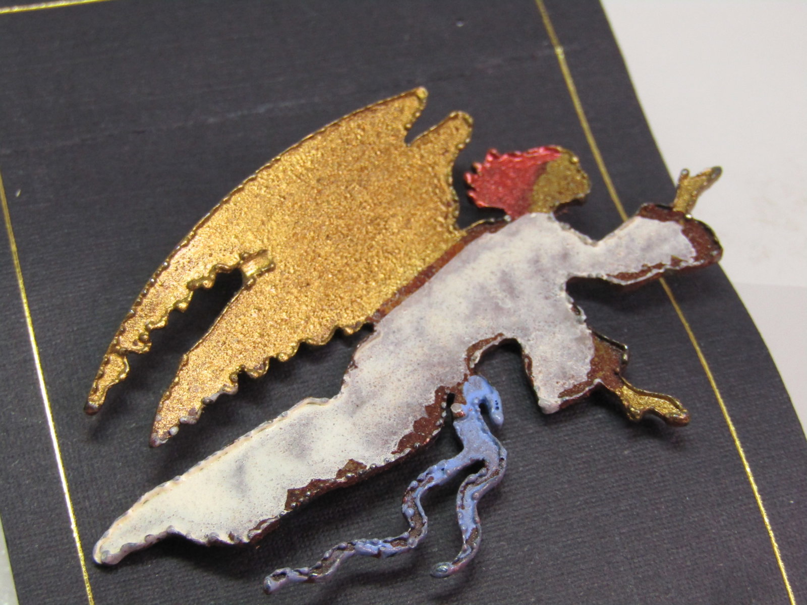 Enamel Painted Copper Angel Brooch, Gina Napa Valley New on Card: Enamel Painted Copper Angel Brooch, Gina Napa Valley New on Card. This is vintage new stock, exact year unknown but beleived to be 1990's or after. It is titled "Guardian". It is on the card and has