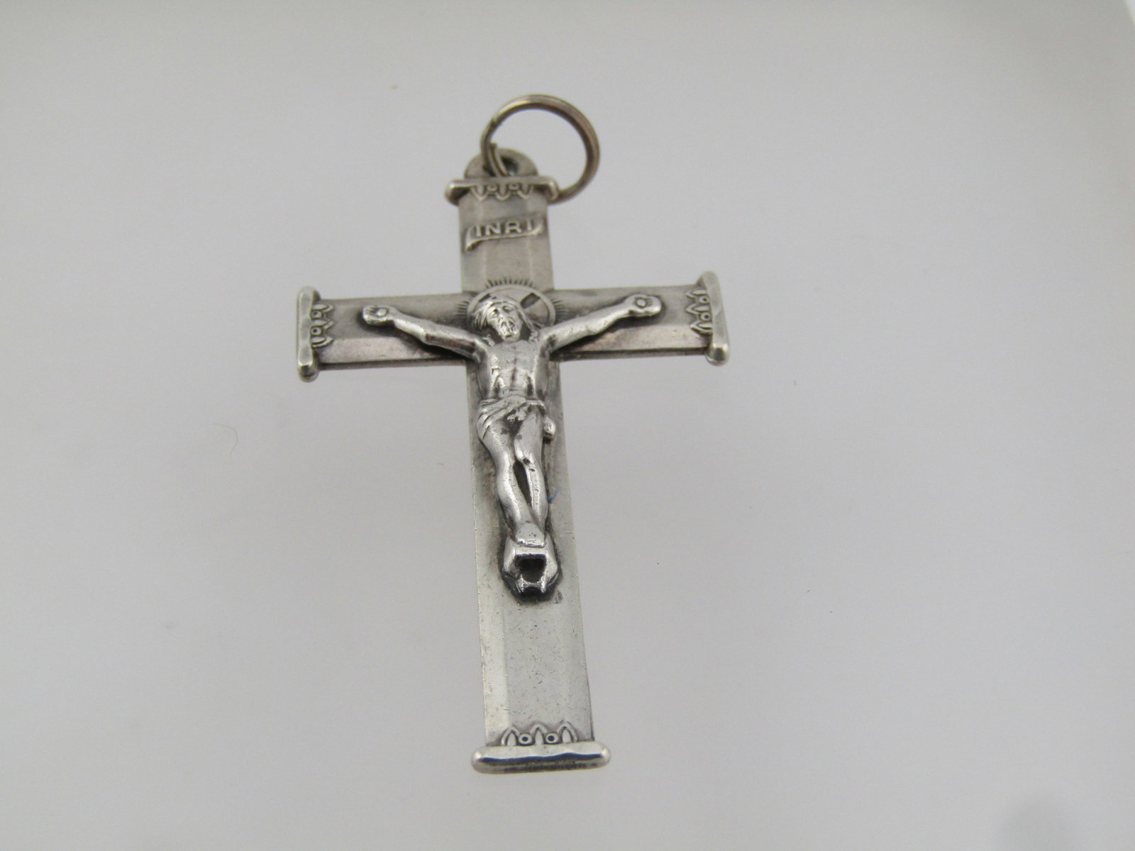 Vintage Sterling Crucifix Pendant, 1940's-1960's, Signed, Unisex: Vintage Sterling Crucifix Pendant, 1940's-1960's, Signed A.F. Co. The ring on top is not sterling. The cross is marked sterling tests as sterling with an appx. weight of 5.53 grams. It is appx. 2" tal