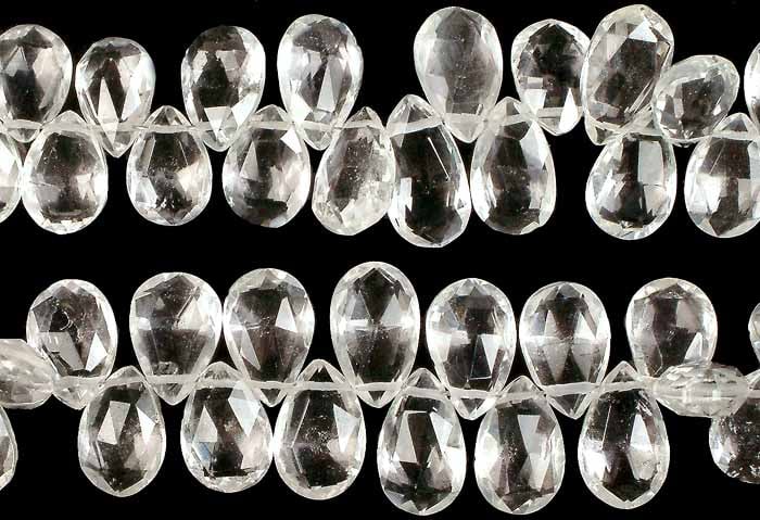 Crystal Faceted Briolette / Semi-Precious Gemstone Beads: Title: Crystal Faceted Briolette / Semi-Precious Gemstone Beads Description: This Crystal Faceted Briolette embodies an ethereal elegance, its multifaceted surface capturing and refracting light with 