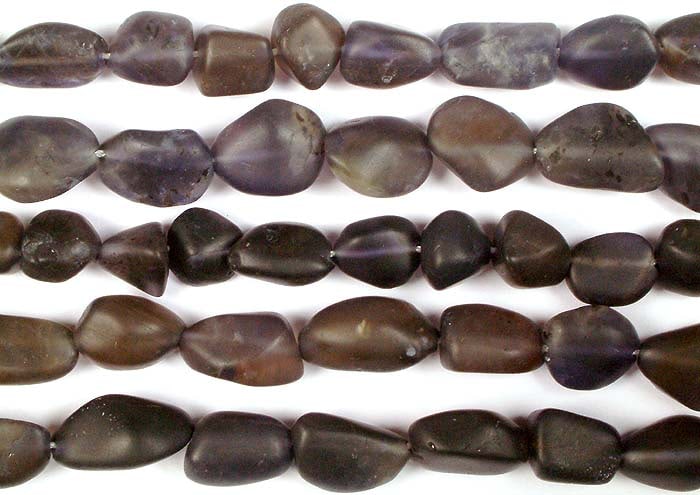 Unpolished Iolite Nuggets / Gemstone Beads: Title: Unpolished Iolite Nuggets / Gemstone Beads Description: These Unpolished Iolite Nuggets offer endless creative possibilities for making quirky accessories. Their raw and natural appearance adds