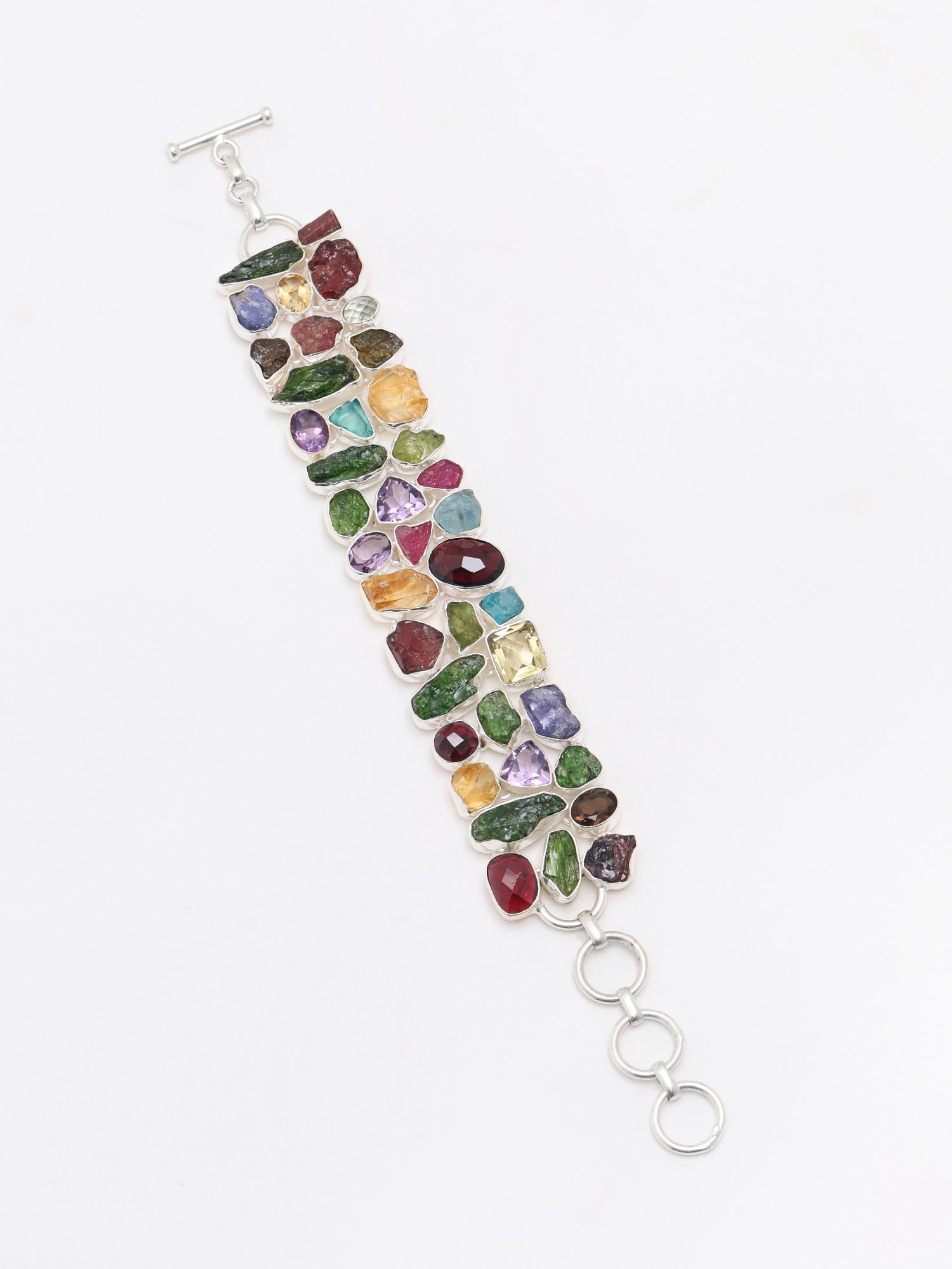 Multi Raw Gemstone Toggle Clamp Lock Bracelet: Title: Multi Raw Gemstone Toggle Clamp Lock Bracelet Description: itemcode : JDG32) Reserve: $751.00 Shipping: Domestic: Shipping rates are determined by destination International: Foreign shipping