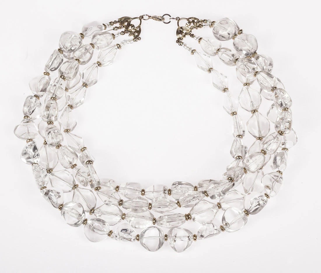 Clear Lucite Nugget Bead Torsade Necklace: Title:Clear Lucite Nugget Bead Torsade Necklace Description:Beautiful four strand necklace of lucite beads separated by smaller, 18 kt gold plated metal beads. Circa, 1960's to 1970's. Strands have th