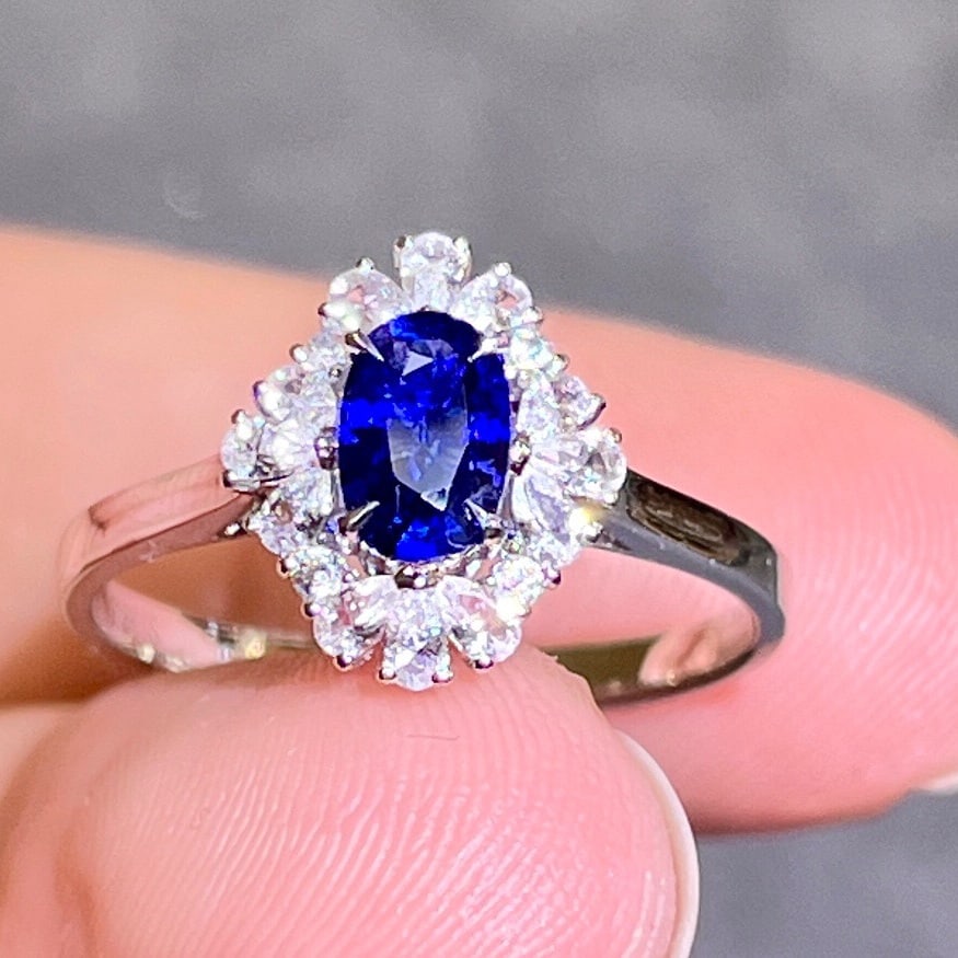 14K GOLD 0.91 CTW NATURAL SAPPHIRE and SAPPHIRE RING: Title:14K GOLD 0.91 CTW NATURAL SAPPHIRE and SAPPHIRE RING Description:Ref:230678186Gold Content:14K GoldRing Size:7.25USMain Gemstone:SapphireNumber of stones:1Shape:OvalCarat Weight:0.51ct Color:Roy