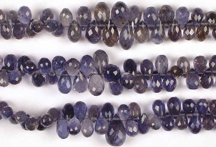 Iolite Faceted Drops / Semi-Precious Gemstone Beads: Title: Iolite Faceted Drops / Semi-Precious Gemstone Beads Description: Embrace clear vision with these Iolite faceted drops. Iolite, also known as "water sapphire," is associated with the third eye