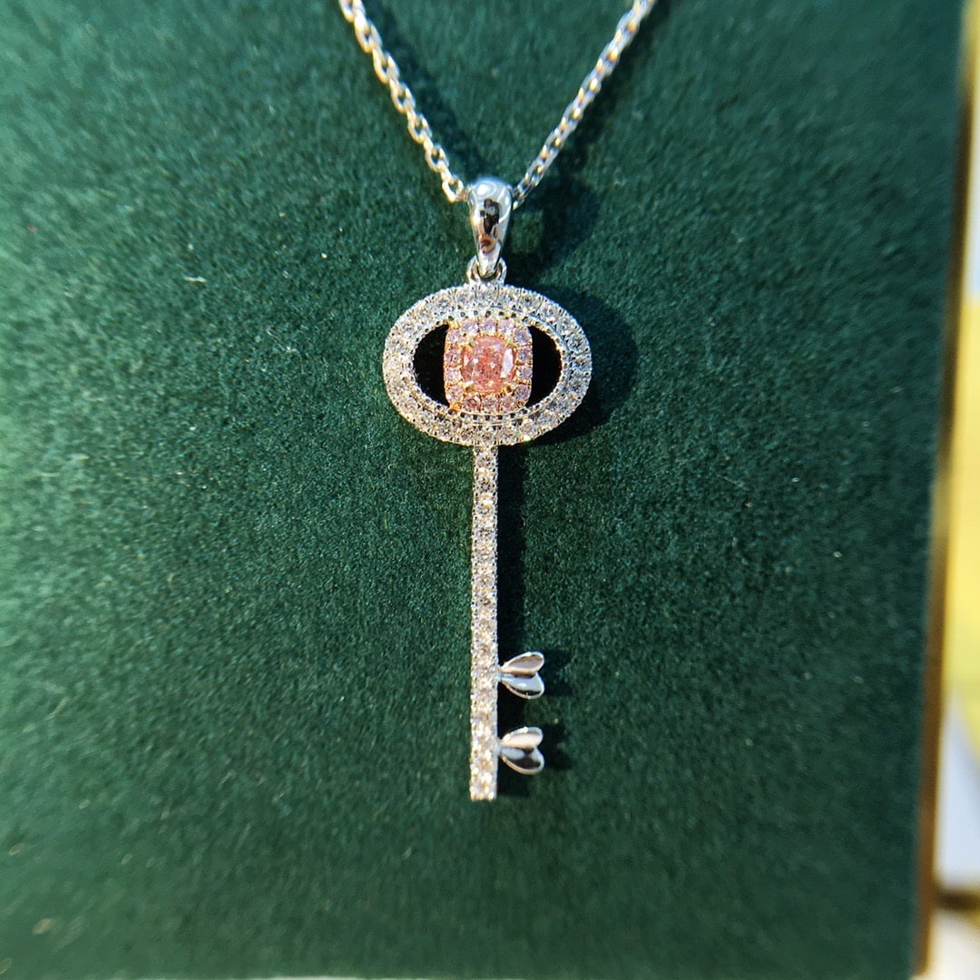 14K GOLD 0.45 CTW NATURAL PINK DIAMOND and DIAMOND NECKLACE: Title:14K GOLD 0.45 CTW NATURAL PINK DIAMOND and DIAMOND NECKLACE Description:Ref:230678162Gold Content:14K GoldMain Gemstone:Pink DiamondNumber of stones:1Shape:CushionCarat Weight:0.13ct